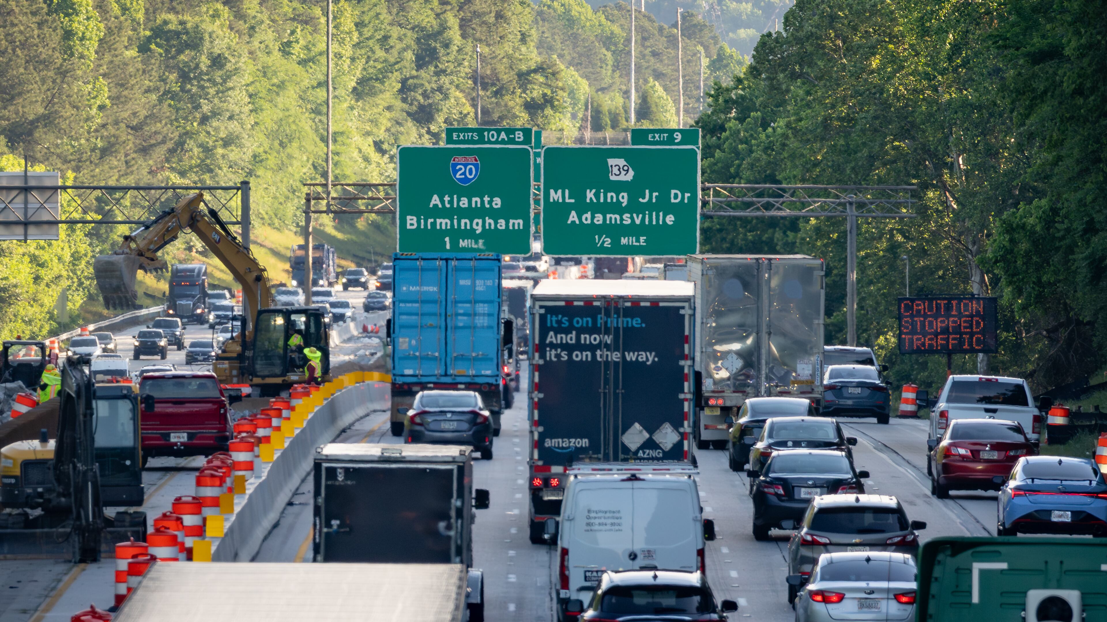 A section of I-285 will be shutdown Mother’s Day weekend. Construction vehicles were in the area during rush hour near the Cascade Road exit on Tuesday, May 5, 2026. (Ben Hendren for the AJC)