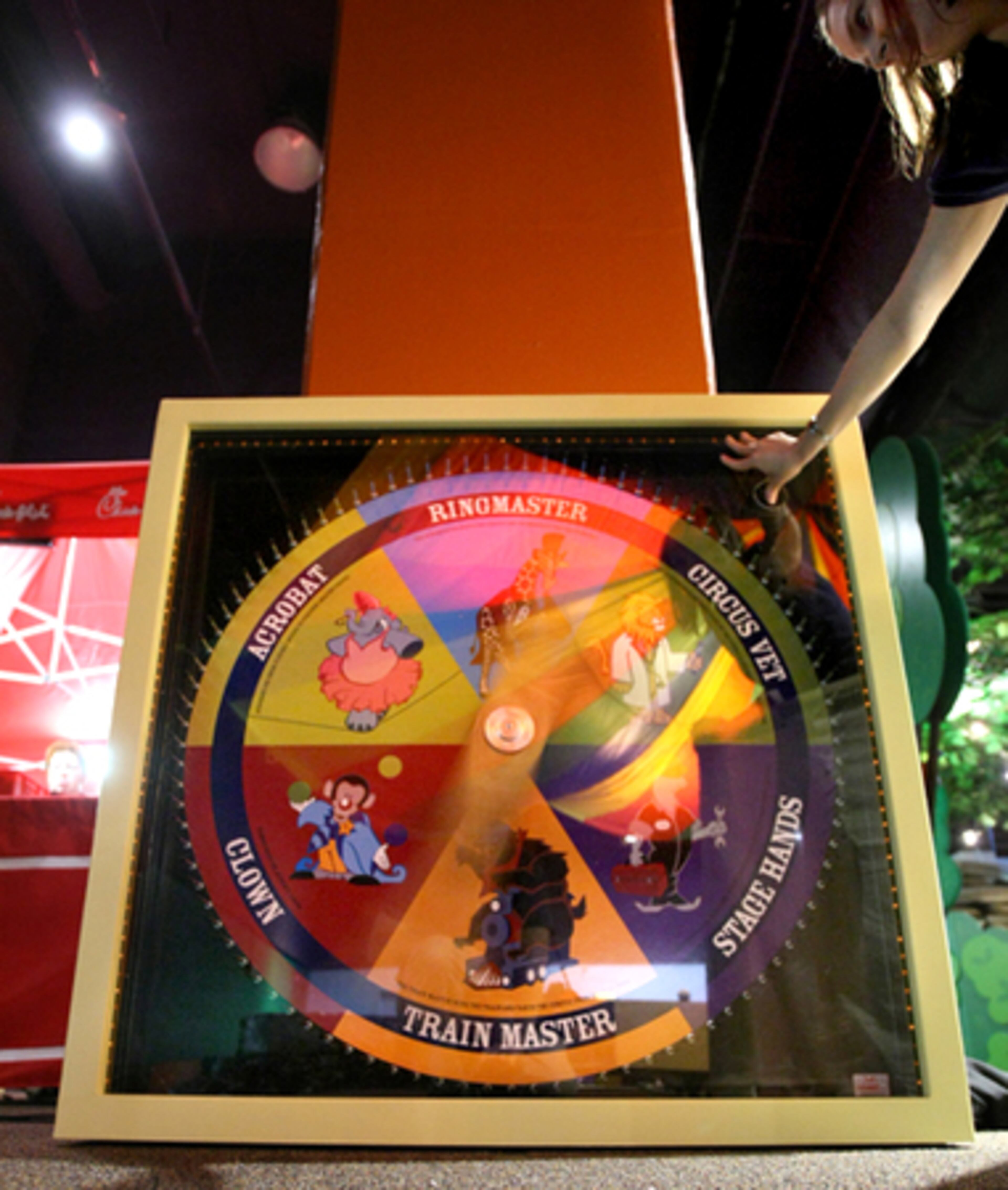 Lisa Bokovoy spins the wheel of jobs. Imagine It! usually uses traveling, pre-made exhibits, but once a year, the staff designs and makes its own.