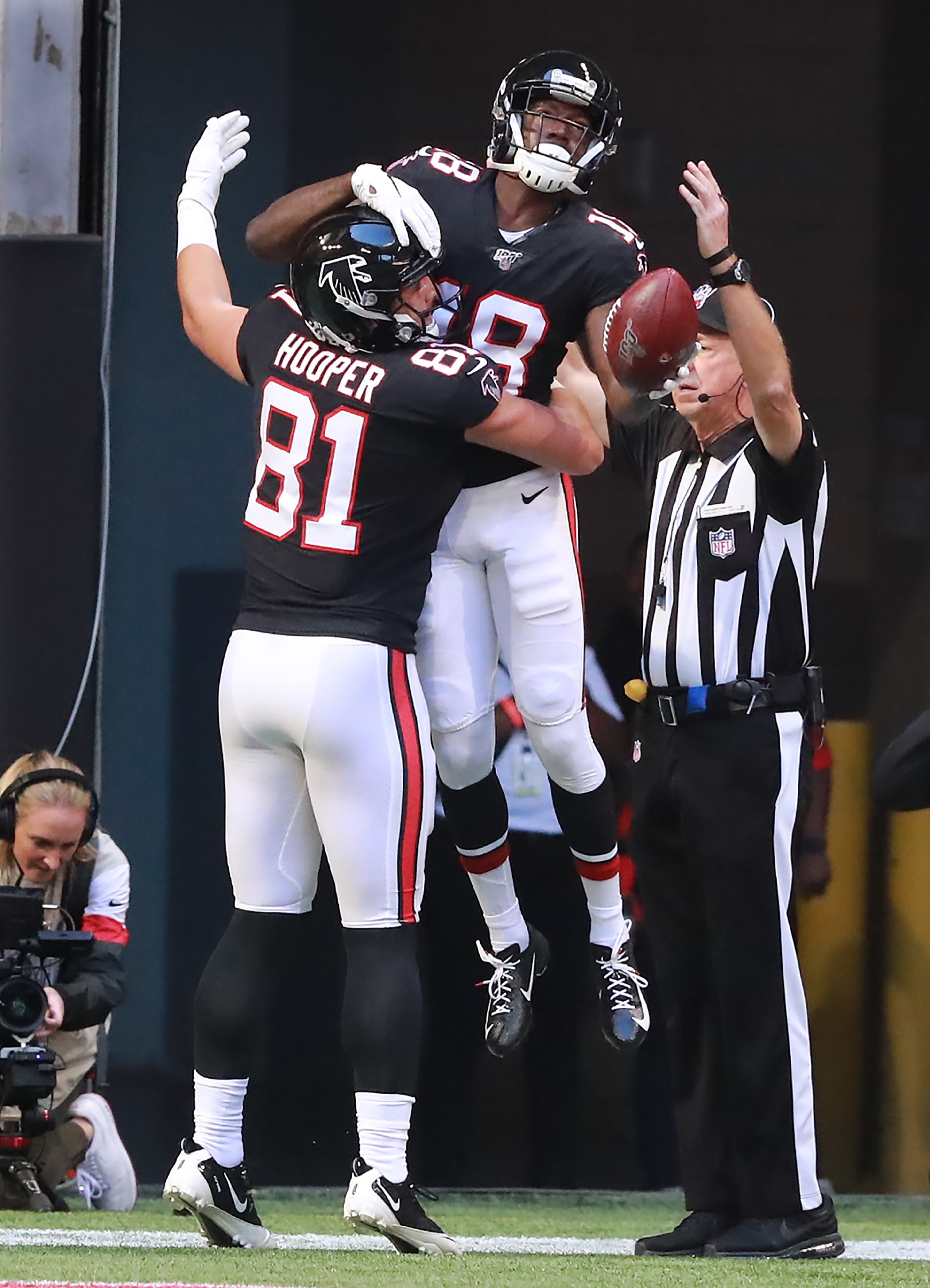 October 27, 2019 Atlanta: Atlanta Falcons wide receiver Calvin Ridley celebrates catching a two-point conversion pass with tight end Austin Hooper in the endzone to cut the Seattle Seahawks lead to 24-8 during the third quarter in an NFL football game on Sunday, October 27, 2019, in Atlanta. Curtis Compton/ccompton@ajc.com