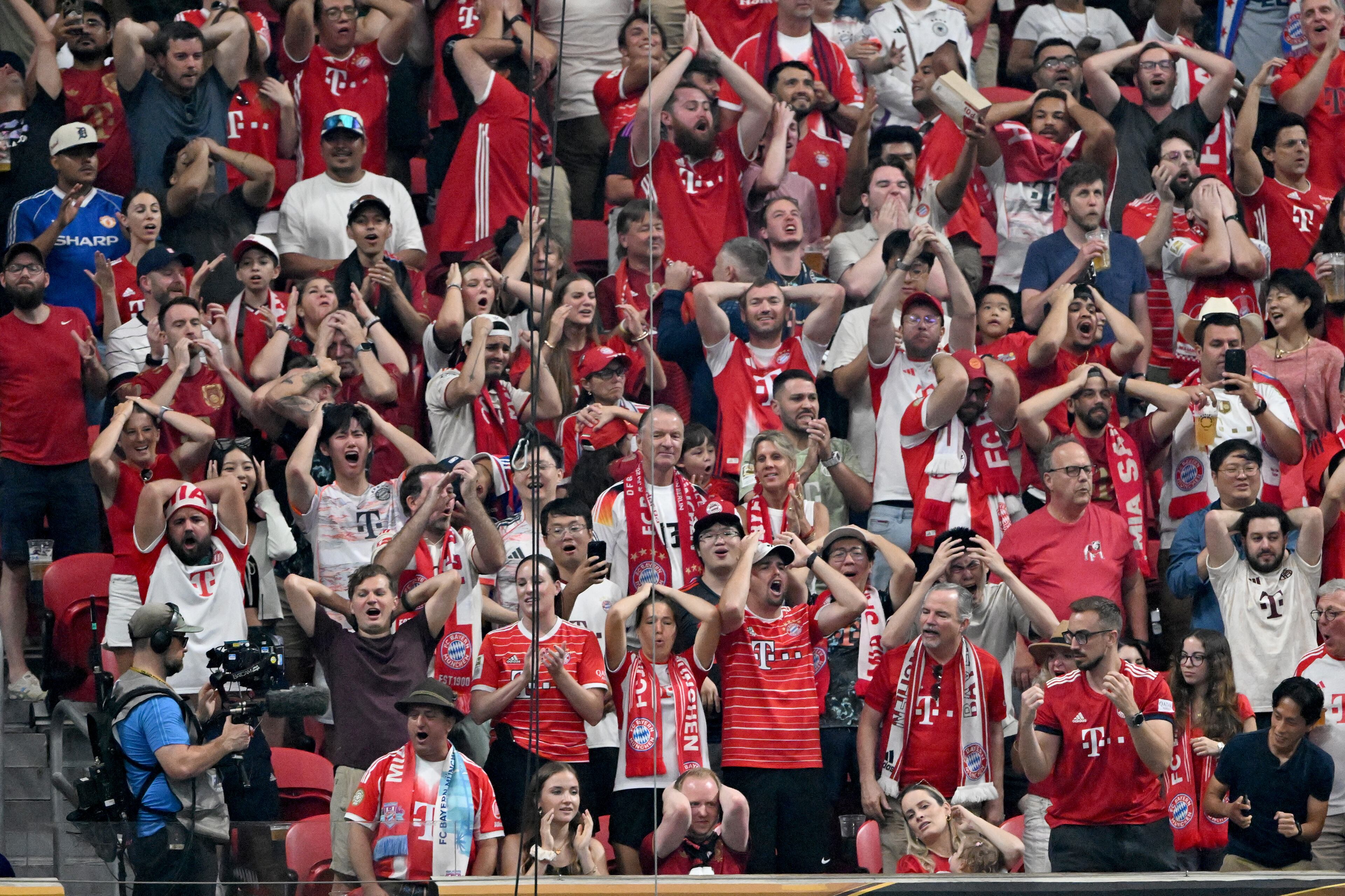 Bayern Munich fans react during the second half in Club World Cup quarterfinals match at Mercedes-Benz Stadium, Saturday, July 5, 2025, in Atlanta. Paris Saint-Germain won 2-0 over Bayern Munich. (Hyosub Shin / AJC)
