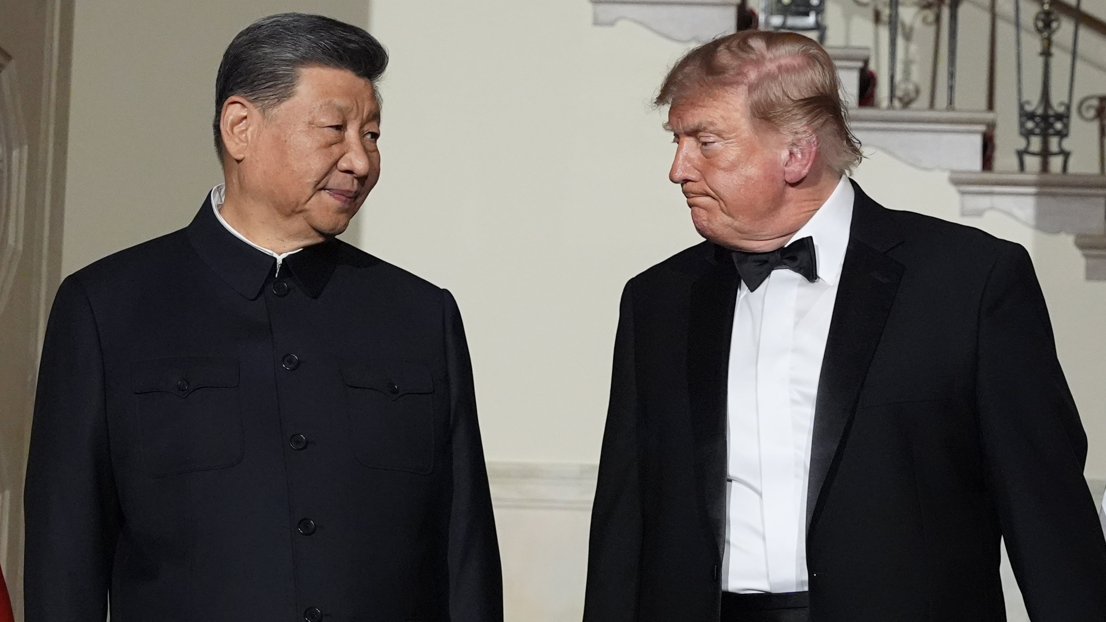 President Donald Trump and China's President Xi Jinping walk in the Grand Foyer of the White House during a State Dinner, Thursday, Sept. 24, 2026, in Washington. (AP Photo/Alex Brandon)