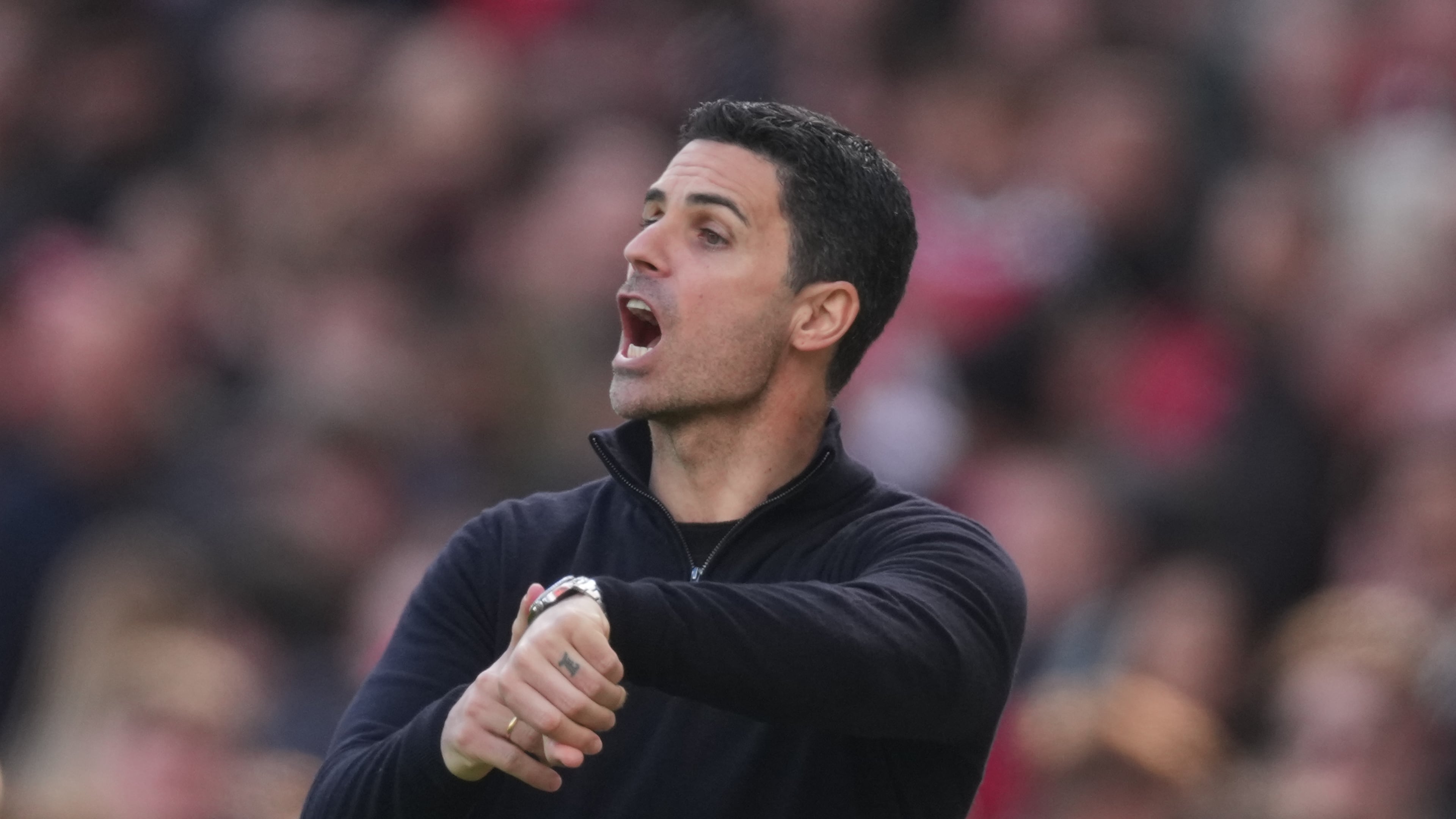 Arsenal's manager Mikel Arteta reacts during the Premier League soccer match between Arsenal and Bournemouth in London, England Saturday, April 11, 2026. (AP Photo/Dave Shopland)