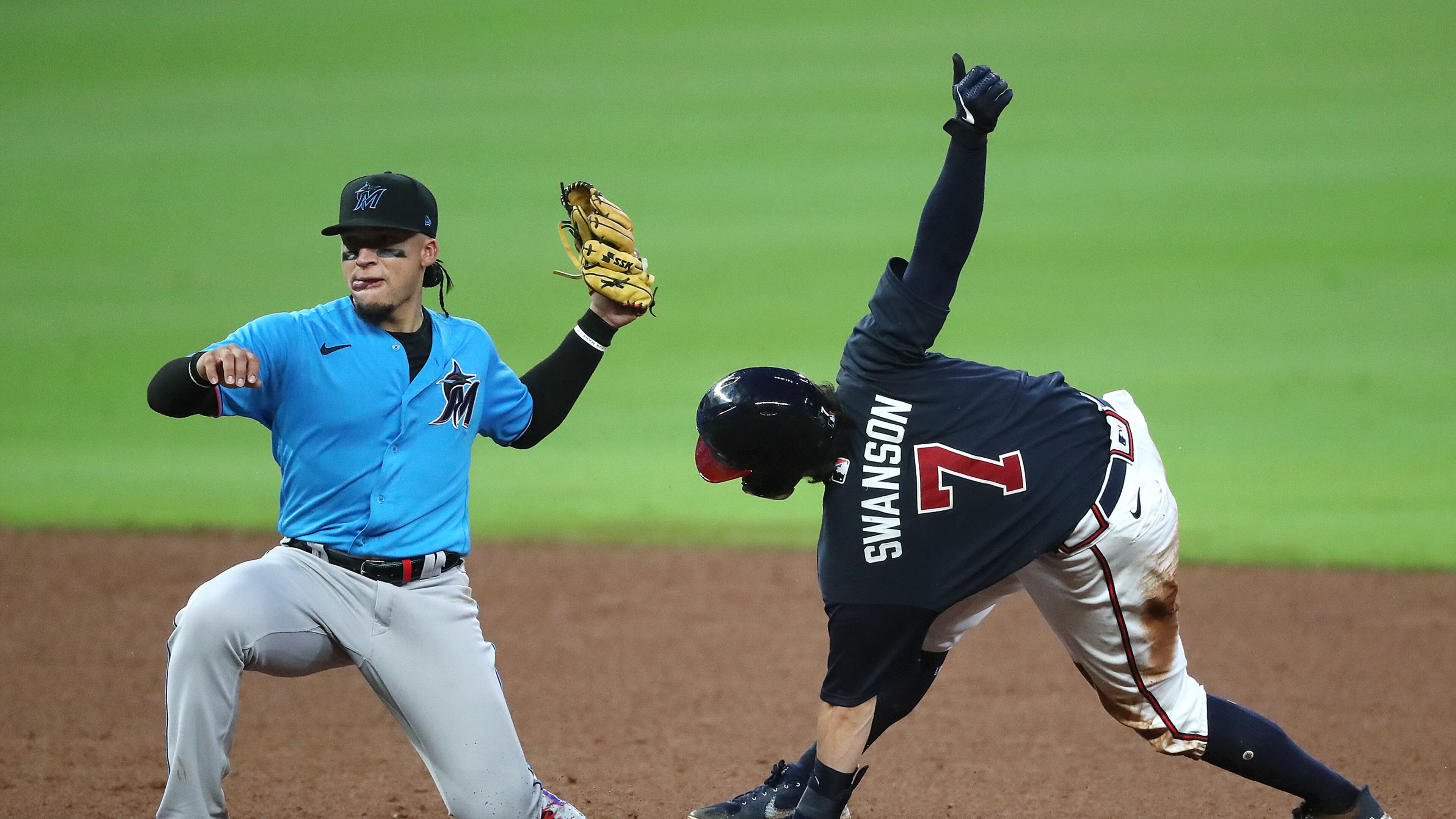 Braves shortstop Dansby Swanson is out stealing second by Miami Marlins second baseman Isan Diaz during the fifth inning in an exhibition game Tuesday, July 21, 2020, at Truit Park in Atlanta.