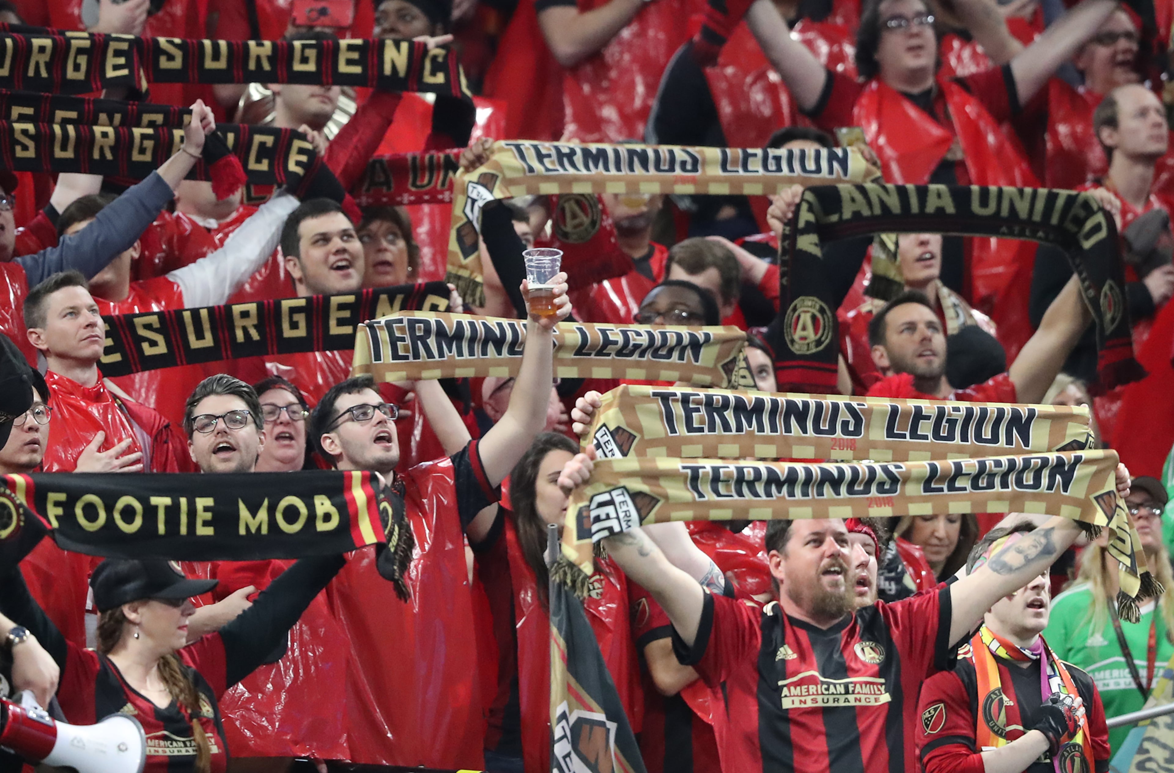 March 11, 2018 Atlanta: A Atlanta United fan toasts the team as they take on the D.C. United during their home opener in a MLS soccer game on Sunday, March 11, 2018, in Atlanta. Curtis Compton/ccompton@ajc.com