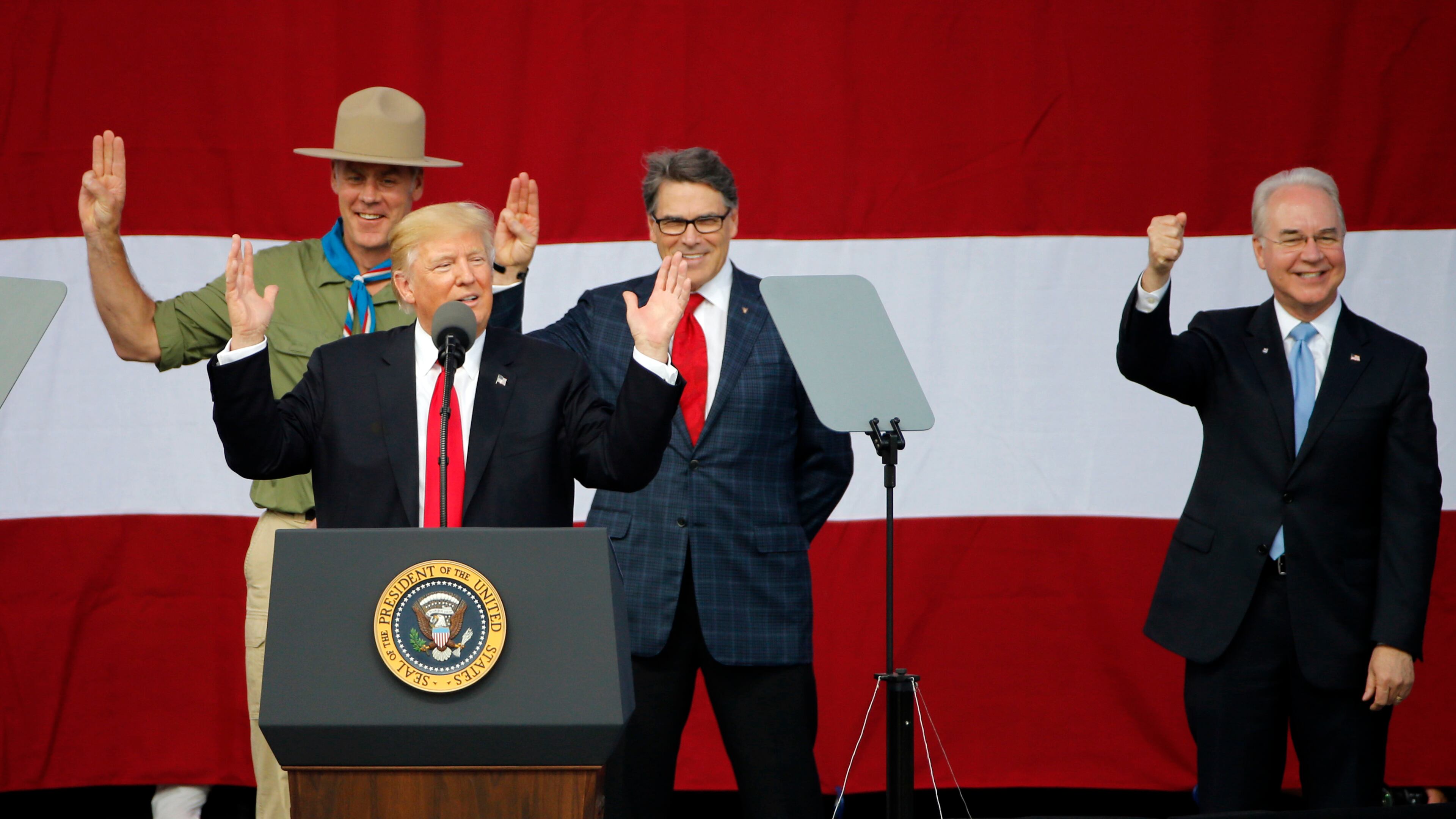 President Donald Trump, front left, with Secretary of Health and Human Services Tom Price, right, at the 2017 National Boy Scout Jamboree at the Summit in Glen Jean, W. Va., on Monday. AP/Steve Helber