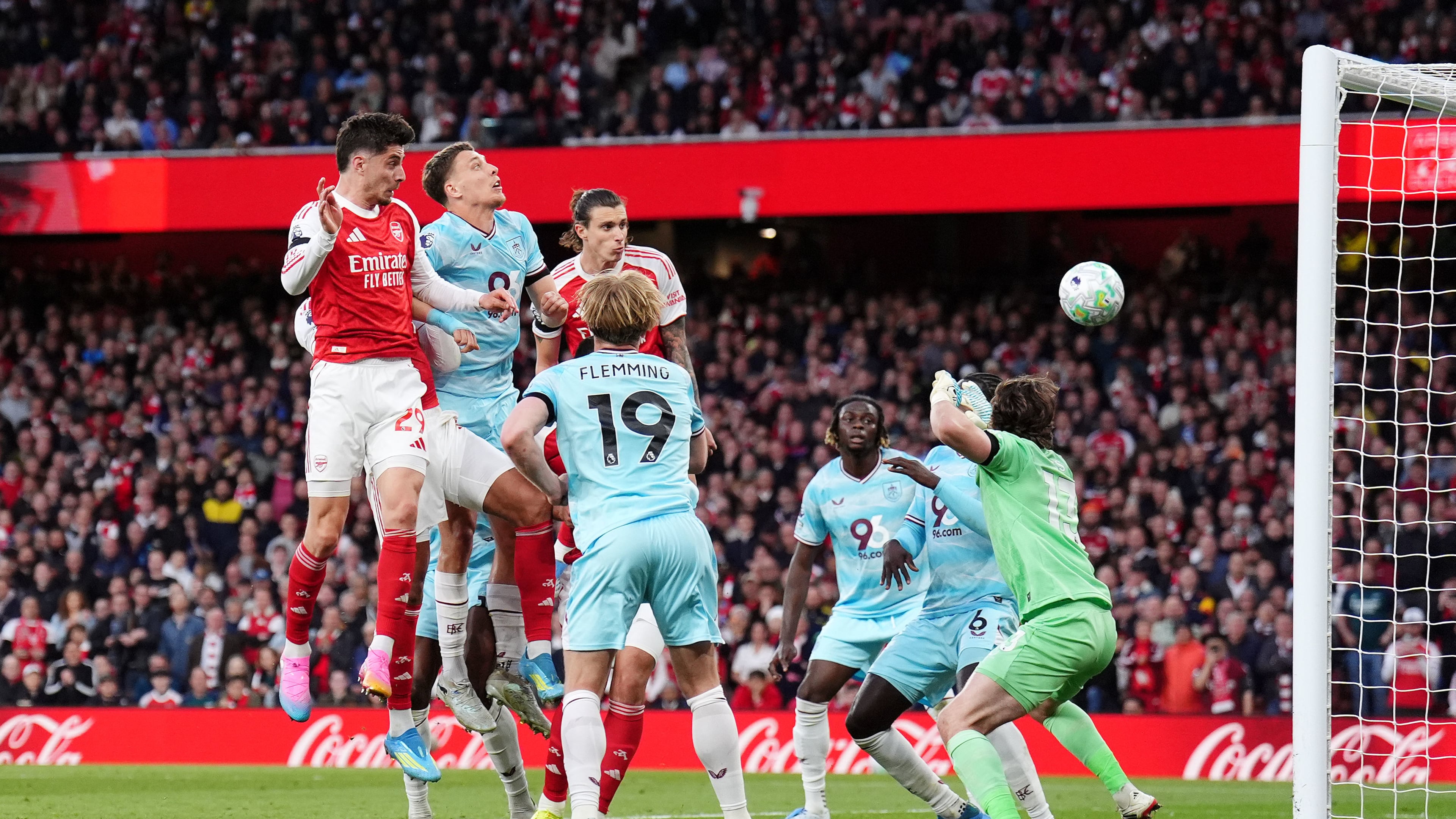 Arsenal's Kai Havertz, left, scores their side's first goal during the English Premier League soccer match between Arsenal and Burnley in London, Monday May 18, 2026. (John Walton/PA via AP)