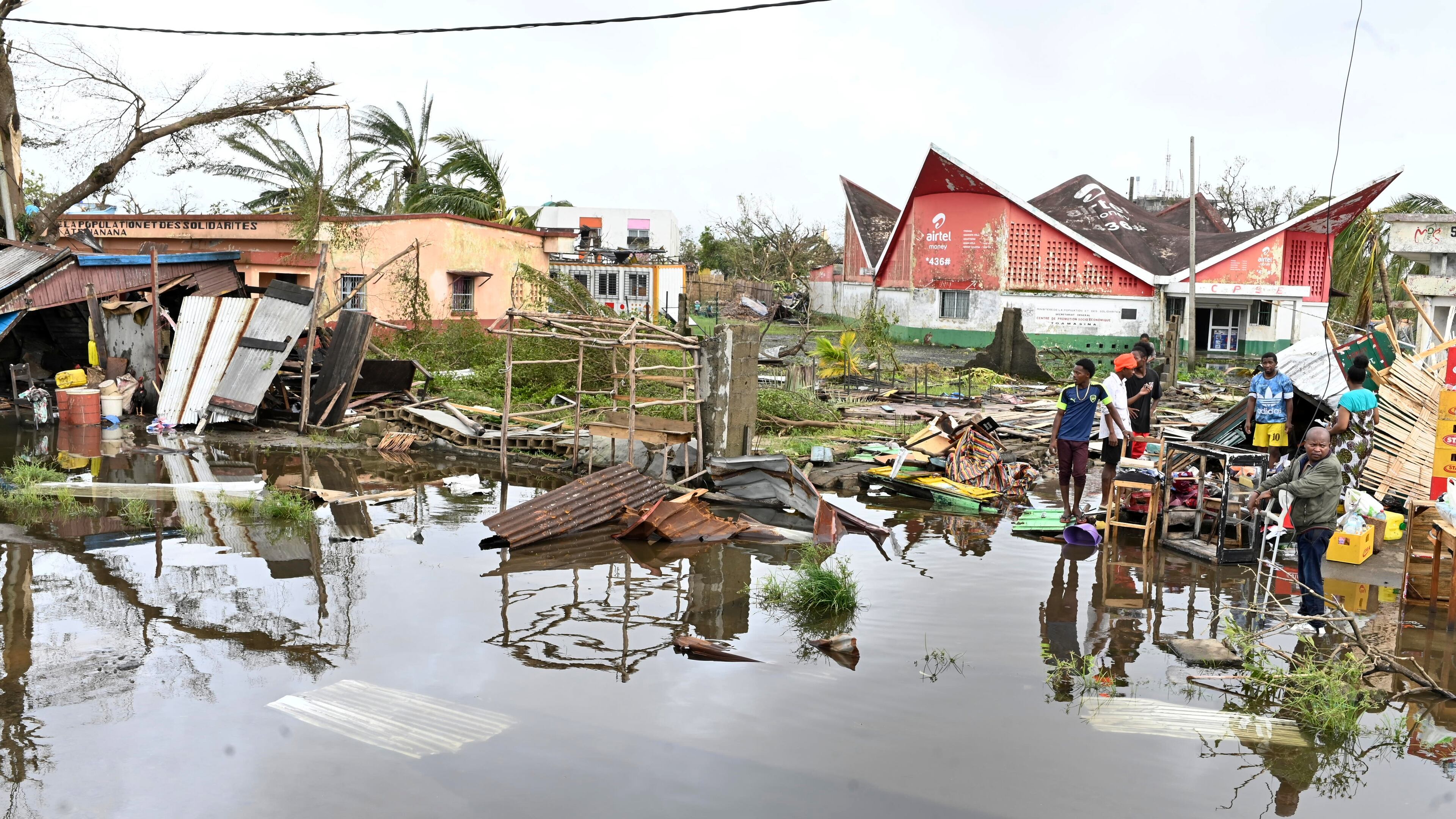 People survey the damage done by cyclone Gezina in Toamasina, Madagascar, Wednesday, Feb. 11, 2026. (AP Photo/Hery Nirina Rabary)
