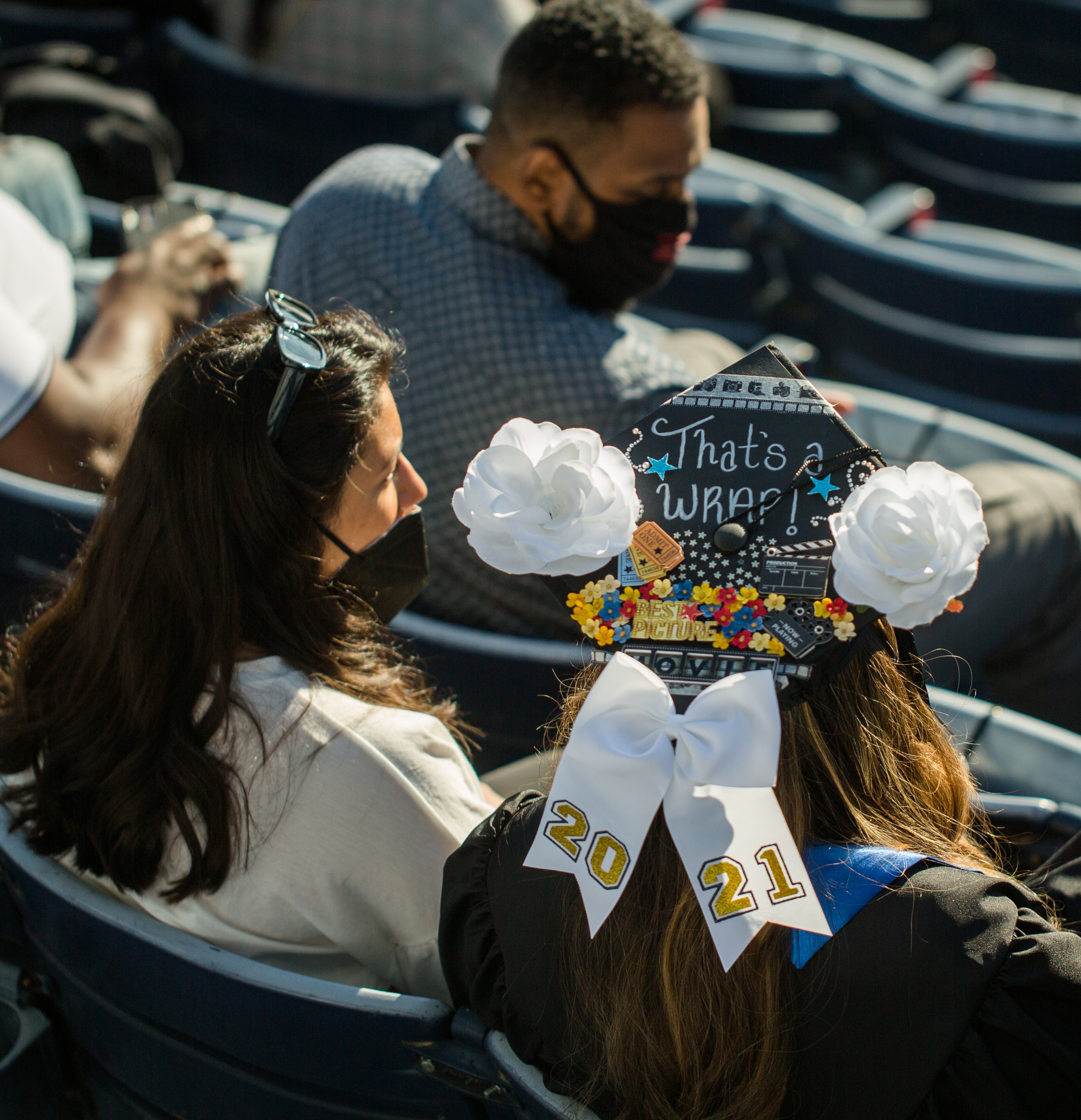 Georgia State University graduation at Center Parc Stadium on Thursday, May 6, 2021 has adjusted for the pandemic with graduates placed in pods where they celebrate with friends and family as their names are read, rather than walking the stage. GSU graduated 5000 students this year. (Jenni Girtman for The Atlanta Journal - Constitution)
