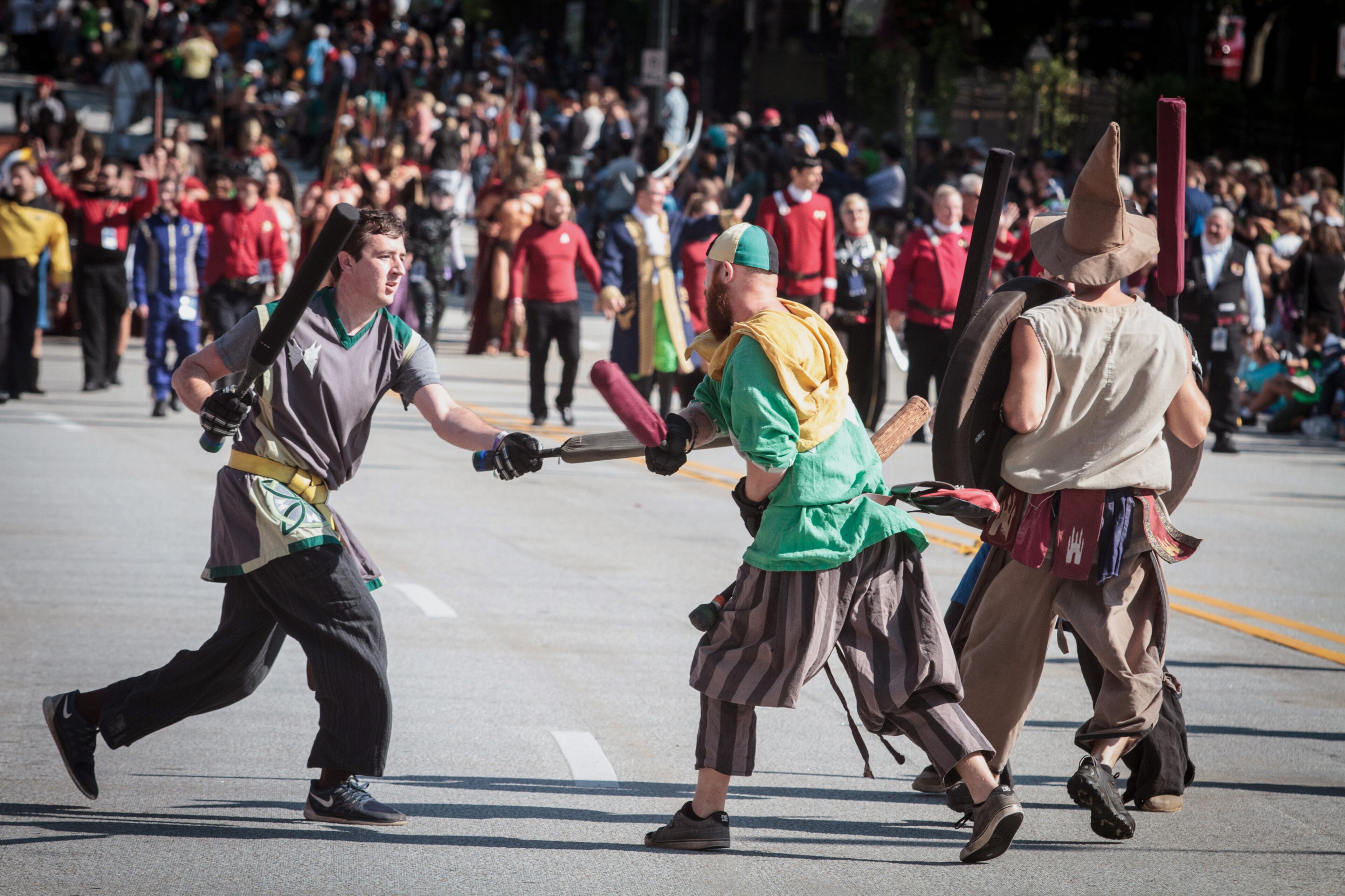 A sword fight breaks out along Peachtree Street during the Dragon Con parade Saturday, September 2, 2017. STEVE SCHAEFER / SPECIAL TO THE AJC