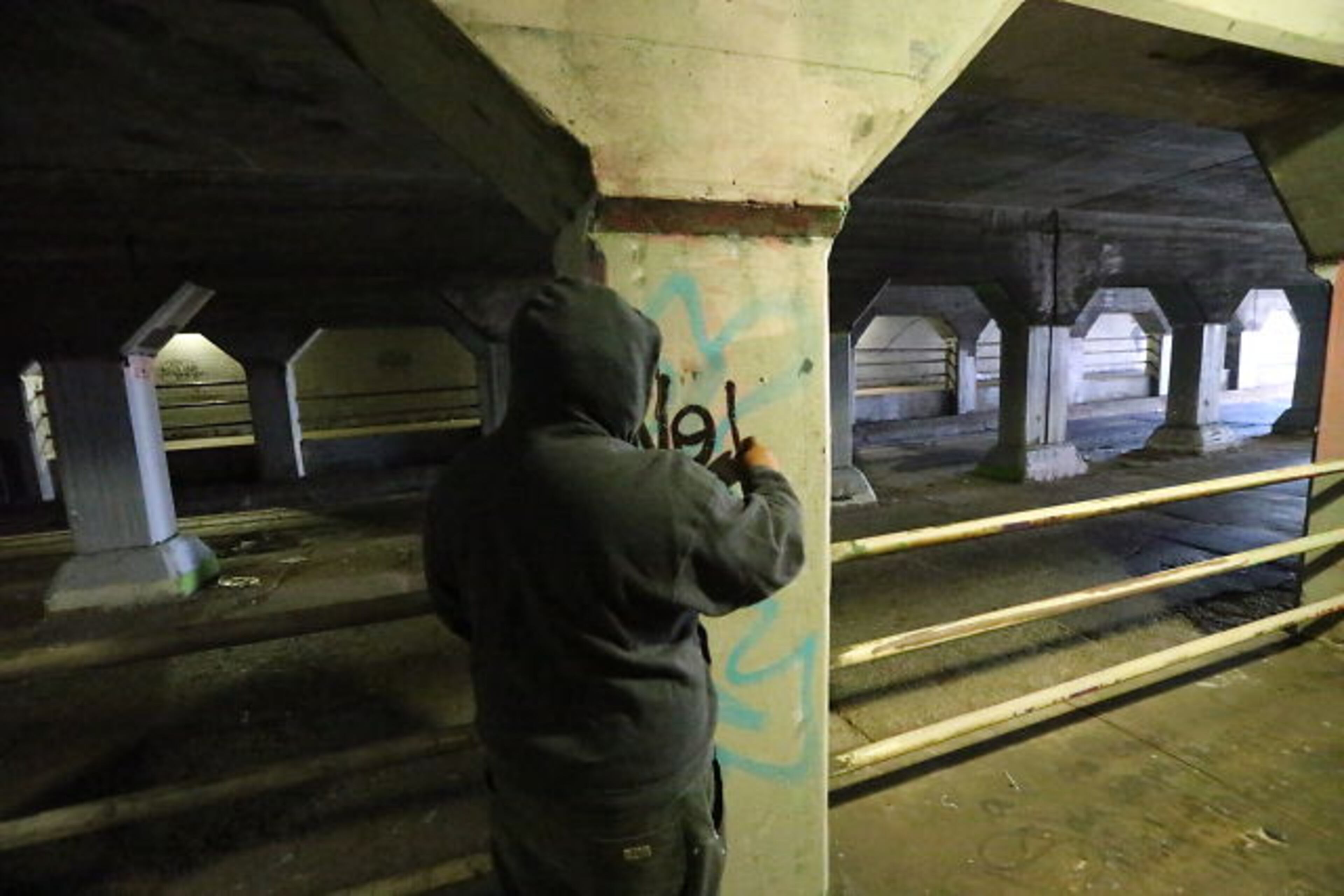 Residents woke Thursday to find that Atlanta's world famous Krog Street tunnel had been painted gray overnight, stripped of its iconic graffiti. The whitewashing was in protest of a masquerade ball that is scheduled to take place there this weekend. JOHN SPINK / JSPINK@AJC.COM