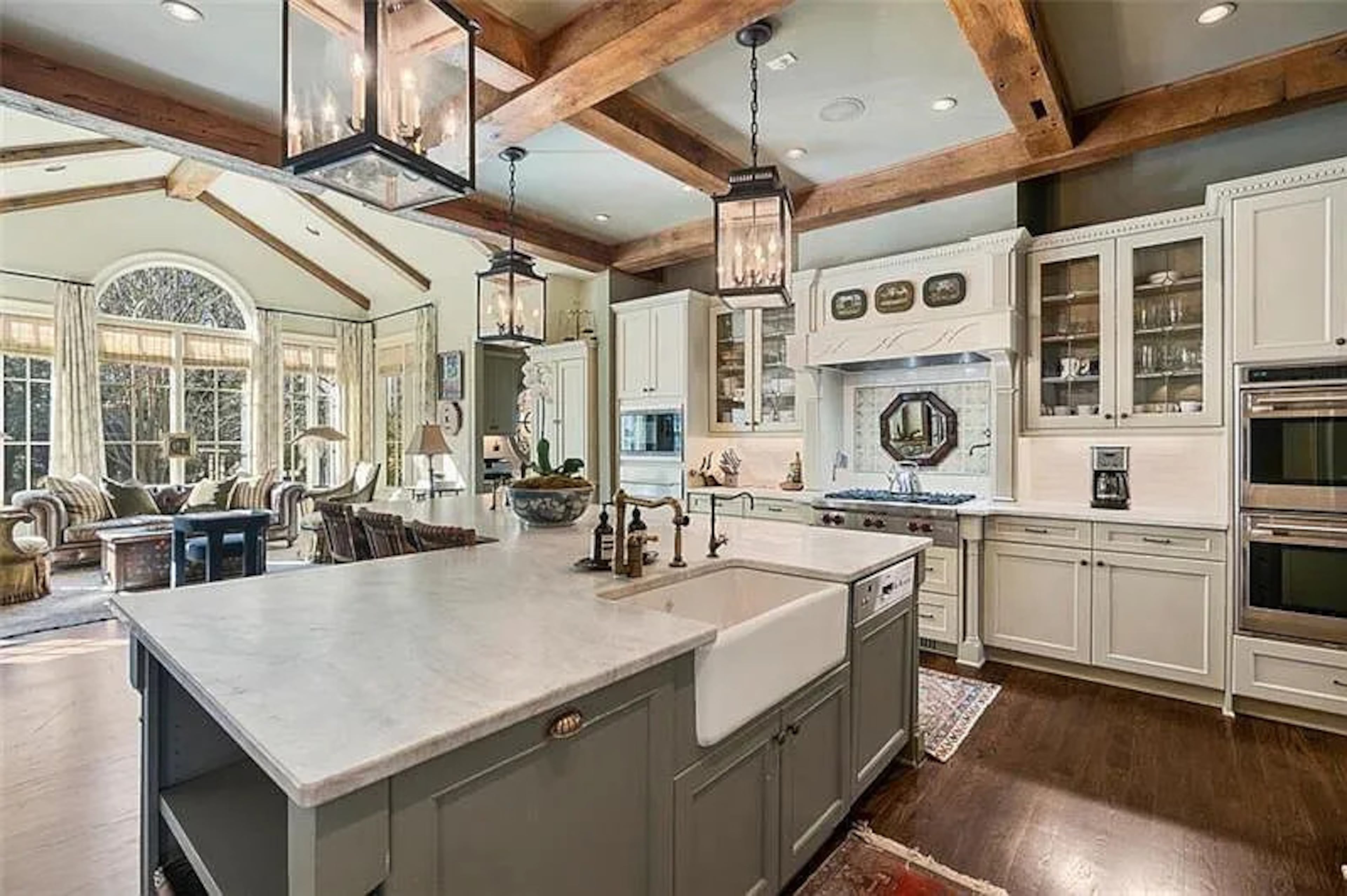 Josh Brolin's Atlanta home includes this gourmet chef’s kitchen anchored by a large center island with ample storage, a casual seating area, and an eat-in dining space. (Courtesy of Jacob Bean)