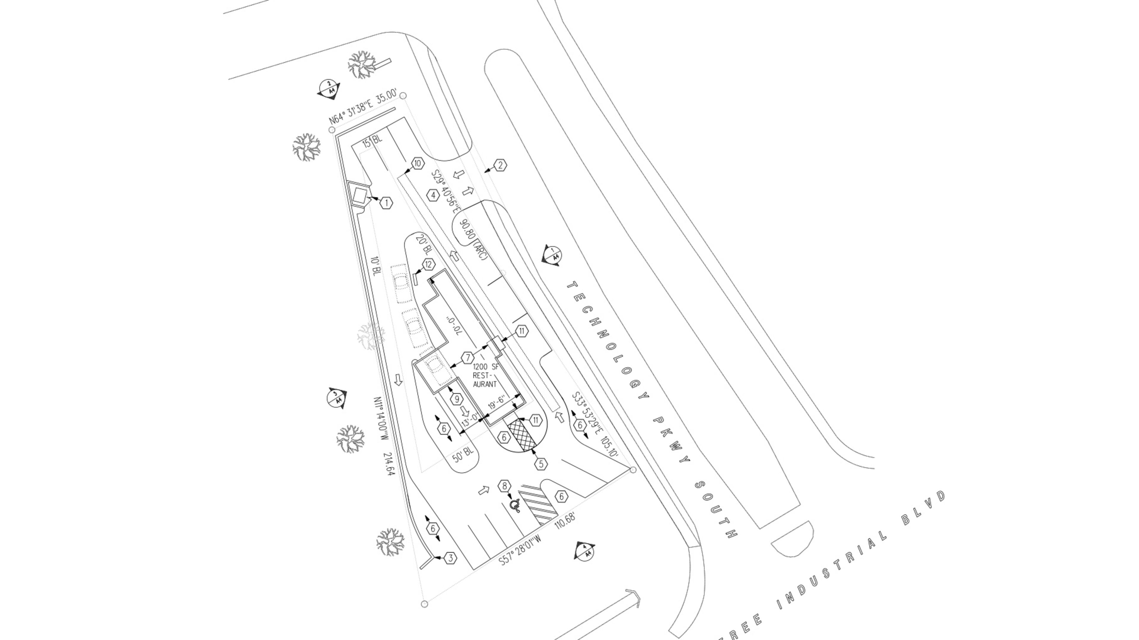 The original site plan for a proposed restaurant at Peachtree Industrial Boulevard and Technology Parkway in Peachtree Corners indicated a drive-thru which was removed in subsequent plans. (Courtesy City of Peachtree Corners)