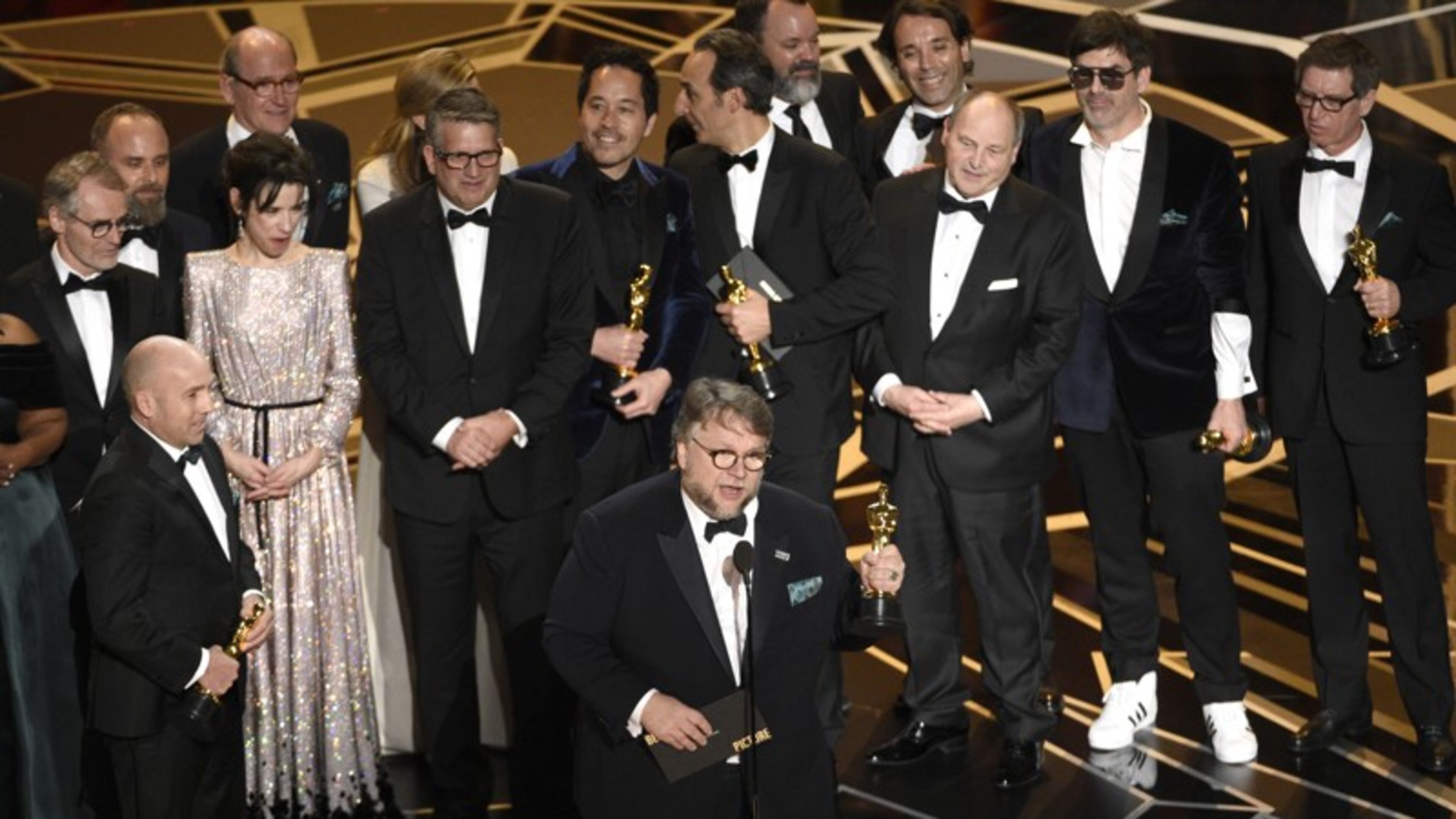 Guillermo del Toro and the cast and crew of "The Shape of Water" accept the award for best picture at the Oscars on Sunday, March 4, 2018, at the Dolby Theatre in Los Angeles. Photo by Chris Pizzello/Invision/AP