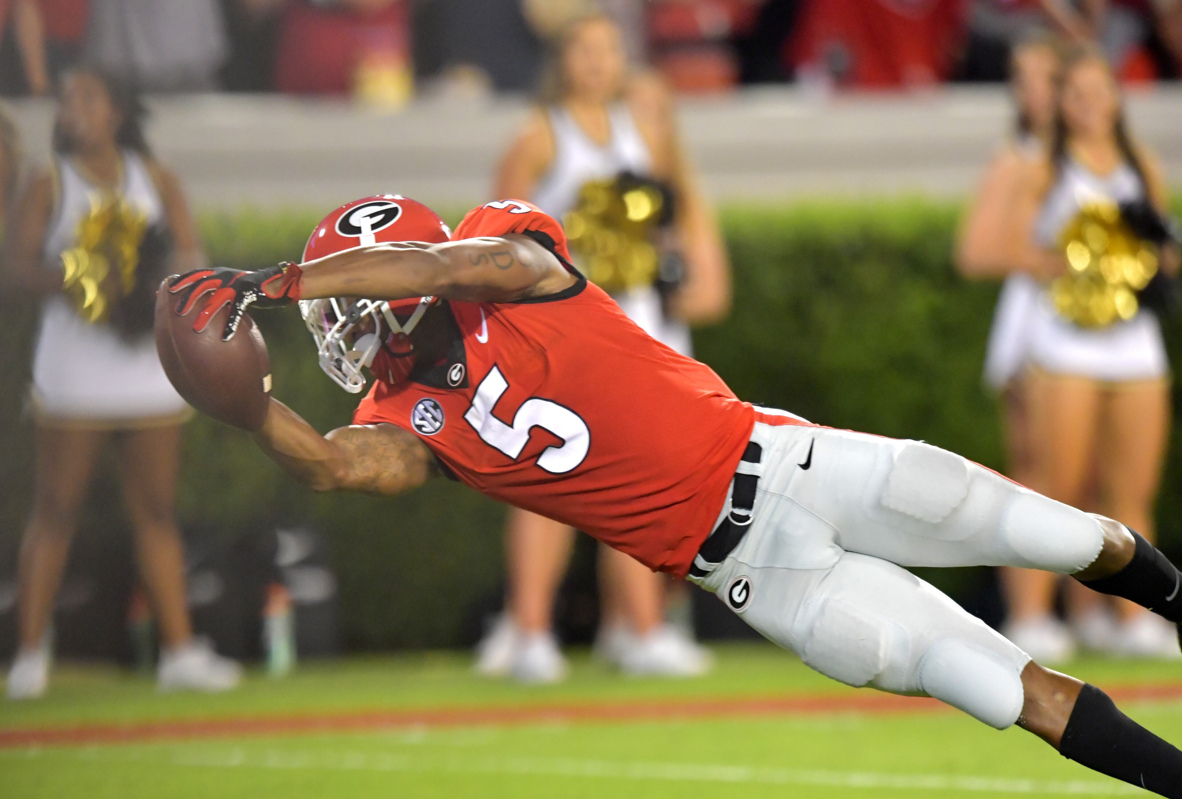 October 6, 2018 Athens - Georgia wide receiver Terry Godwin (5) dives for a touchdown in the first half during a NCAA college football game at Sanford Stadium in Athens on Saturday, October 6, 2018. HYOSUB SHIN / HSHIN@AJC.COM