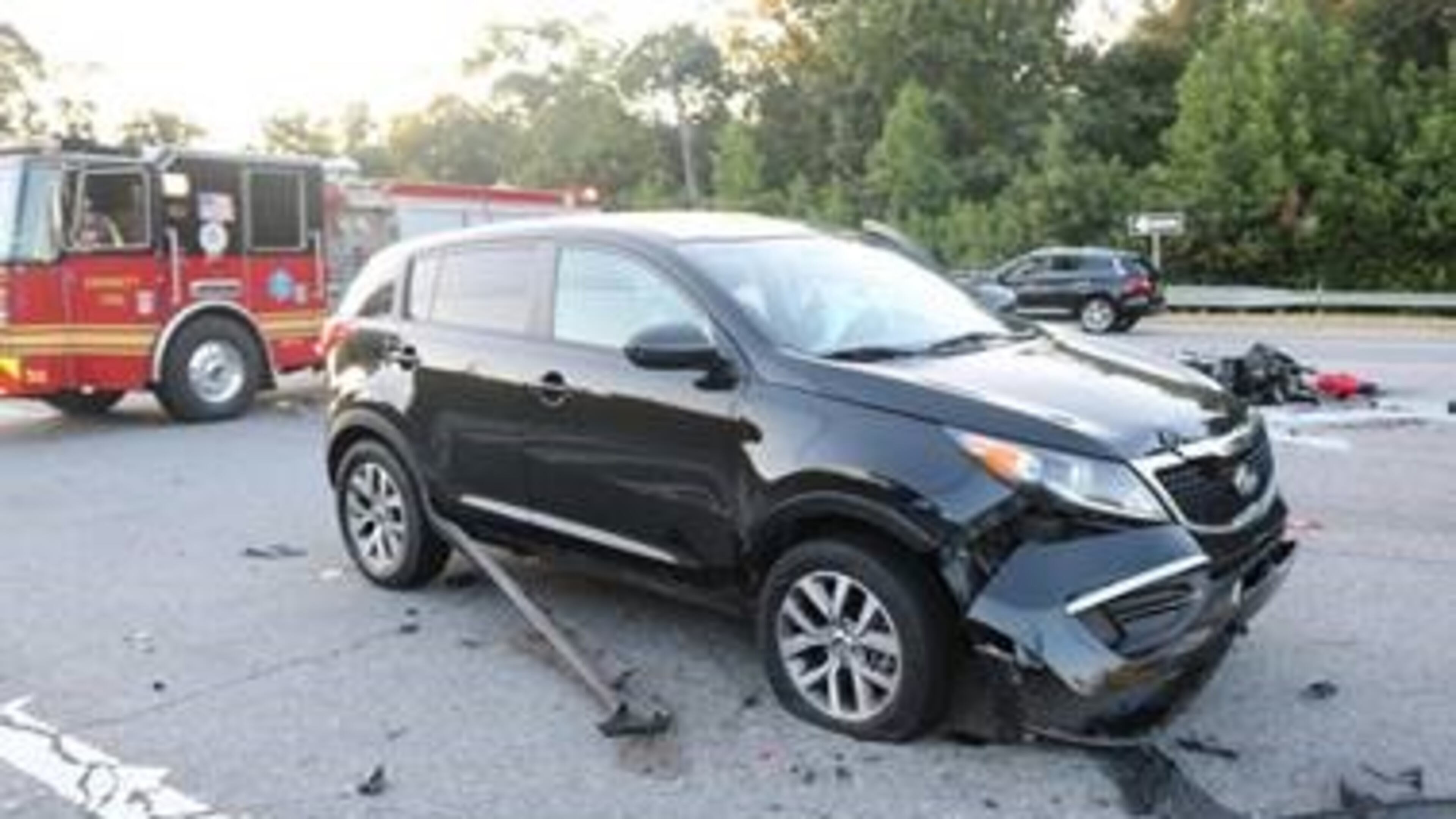 A Lawrenceville woman has been charged in connection with a wreck that killed a motorcyclist two weeks ago, police said.