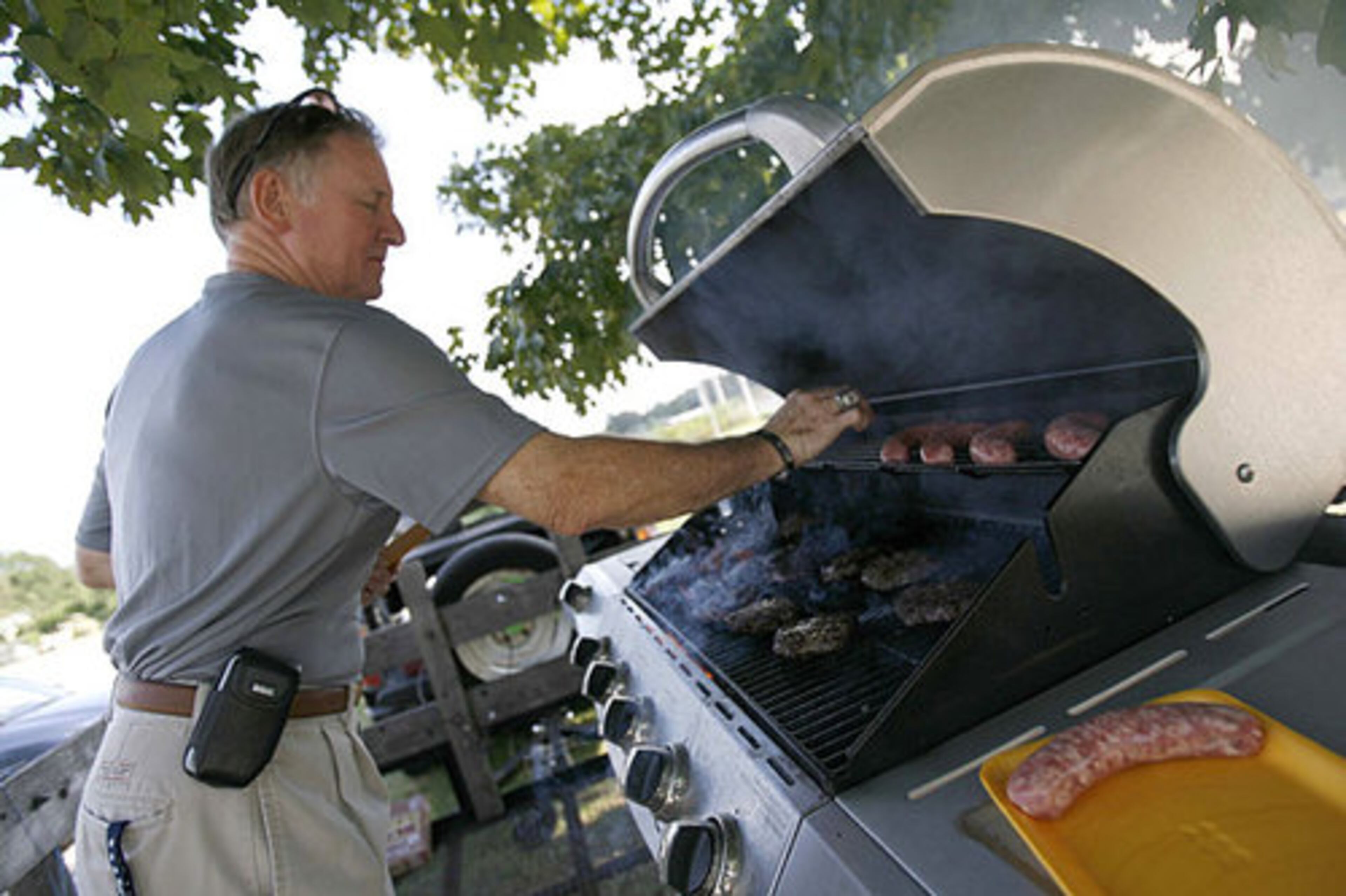 Larry Roberts mans the grill at Grayson.