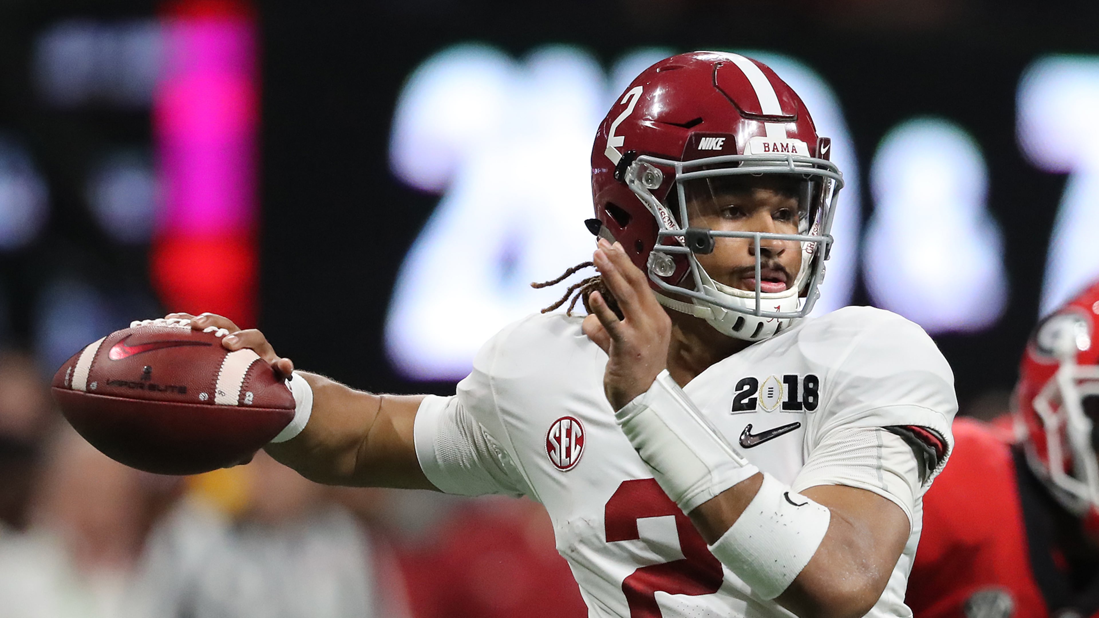 January 8, 2018 Atlanta: Alabama quarterback Jalen Hurts passes against Georgia during the first half in the College Football Playoff National Championship on Monday, January 8, 2018, in Atlanta. Curtis Compton/ccompton@ajc.com