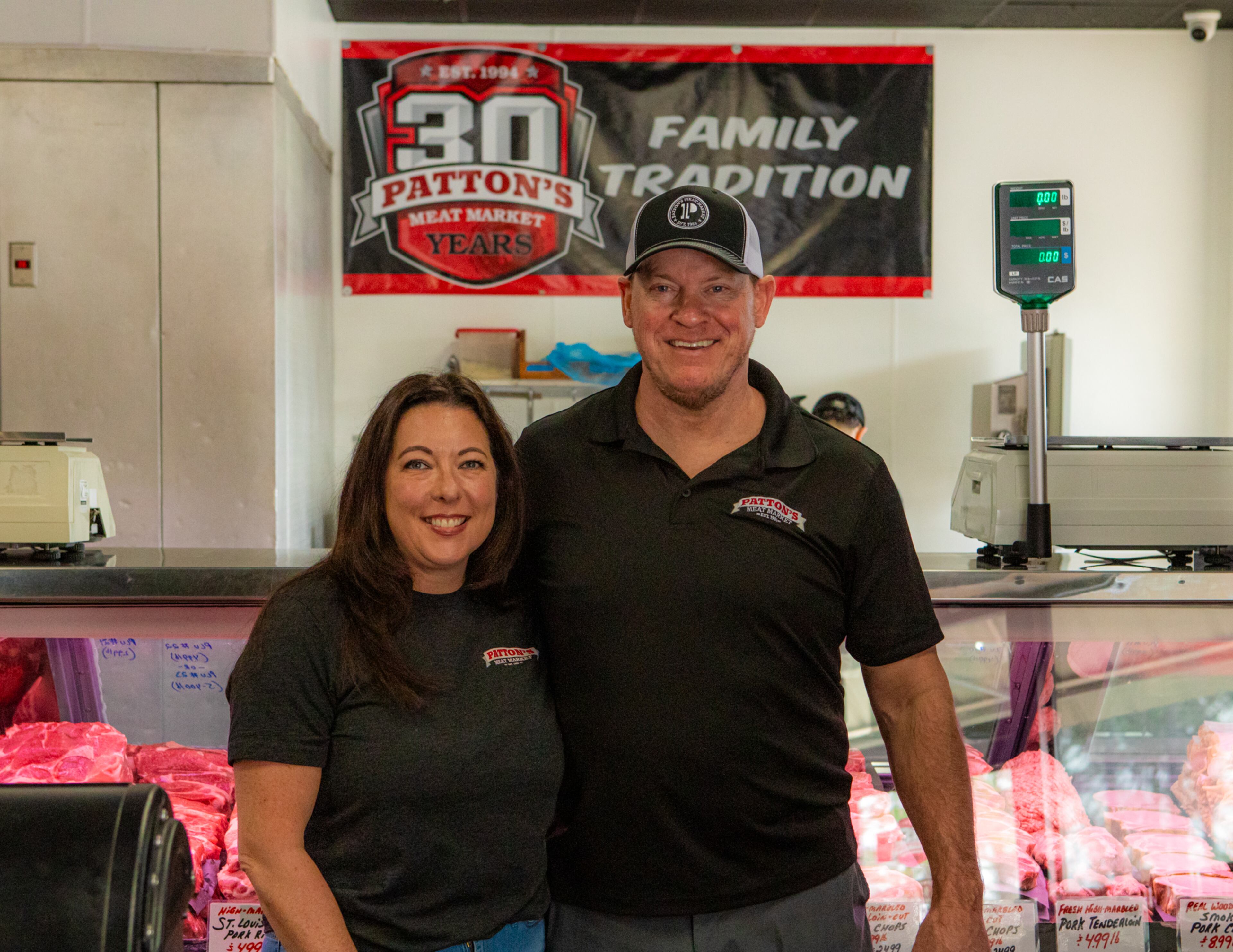 030225 Duluth: owner Parker Patton and his wife Kristine Patton at Patton's Meat Market in Duluth, GA. Photo taken on Friday, February 7th, 2025 for a story about butcher shops.