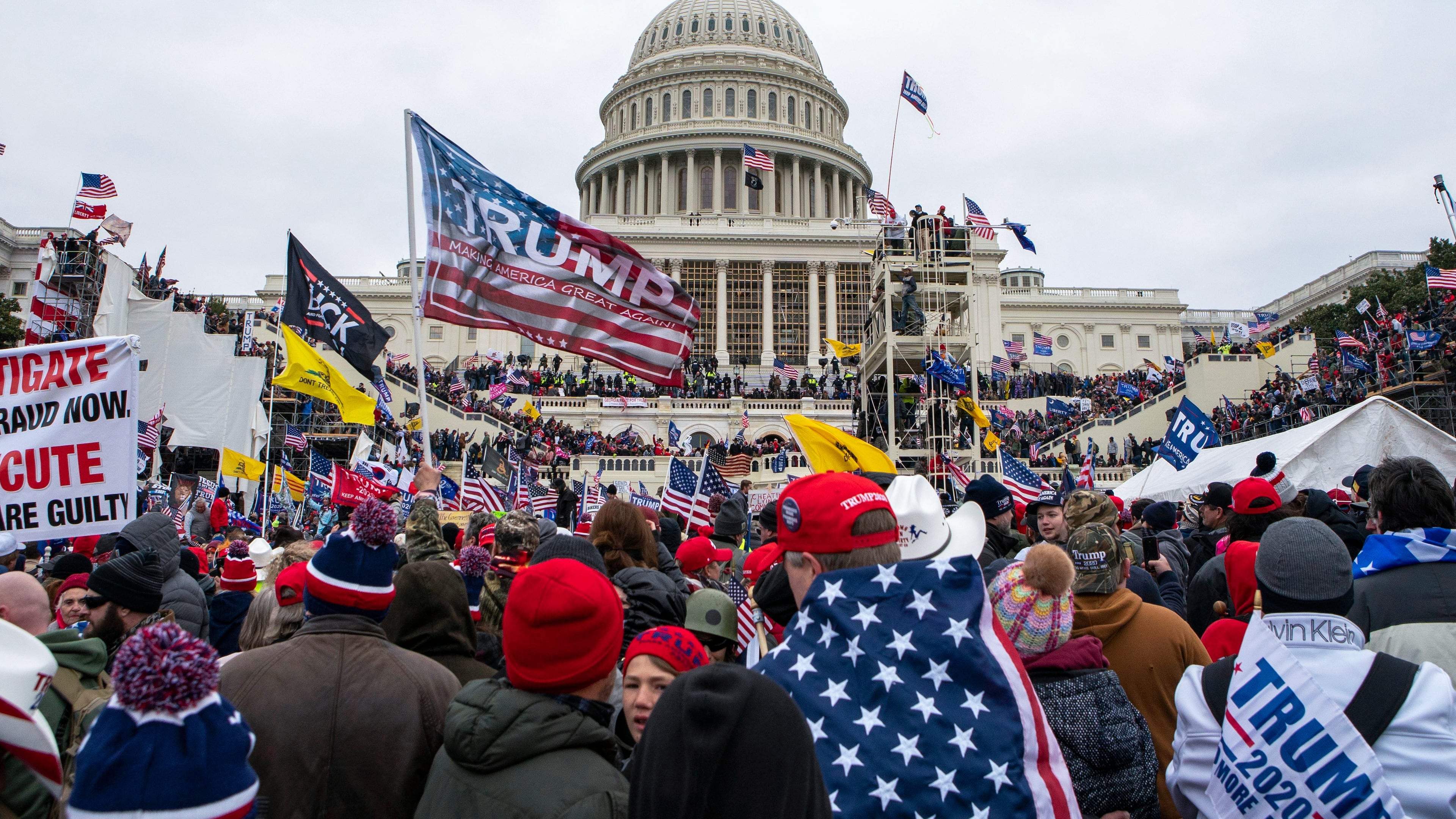 FILE - Rioters loyal to President Donald Trump rally at the U.S. Capitol in Washington on Jan. 6, 2021. (AP Photo/Jose Luis Magana, File)