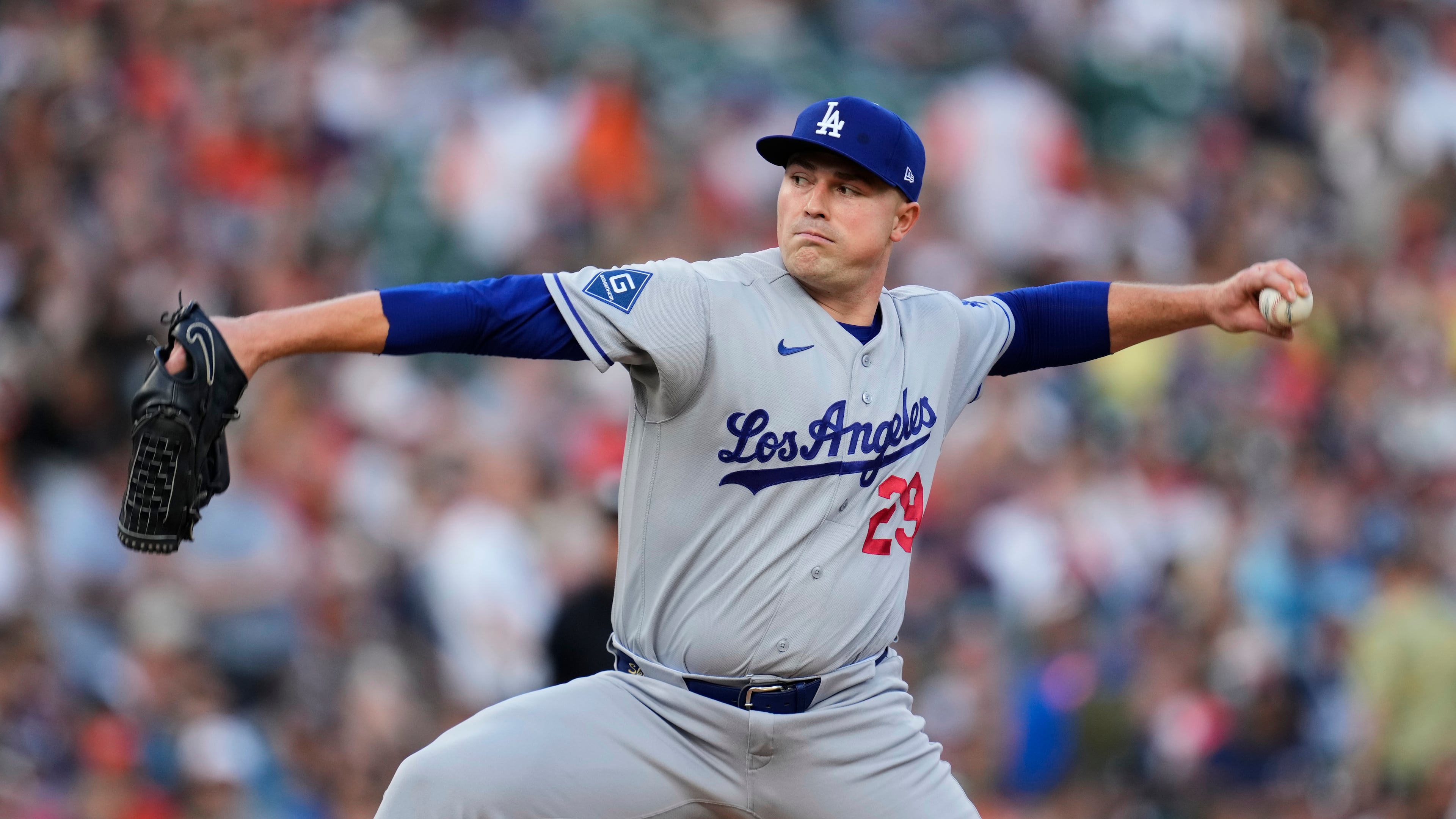 Los Angeles Dodgers pitcher Tarik Skubal throws against the Detroit Tigers during the first inning of a baseball game Friday, Aug. 28, 2026, in Detroit. (AP Photo/Paul Sancya)