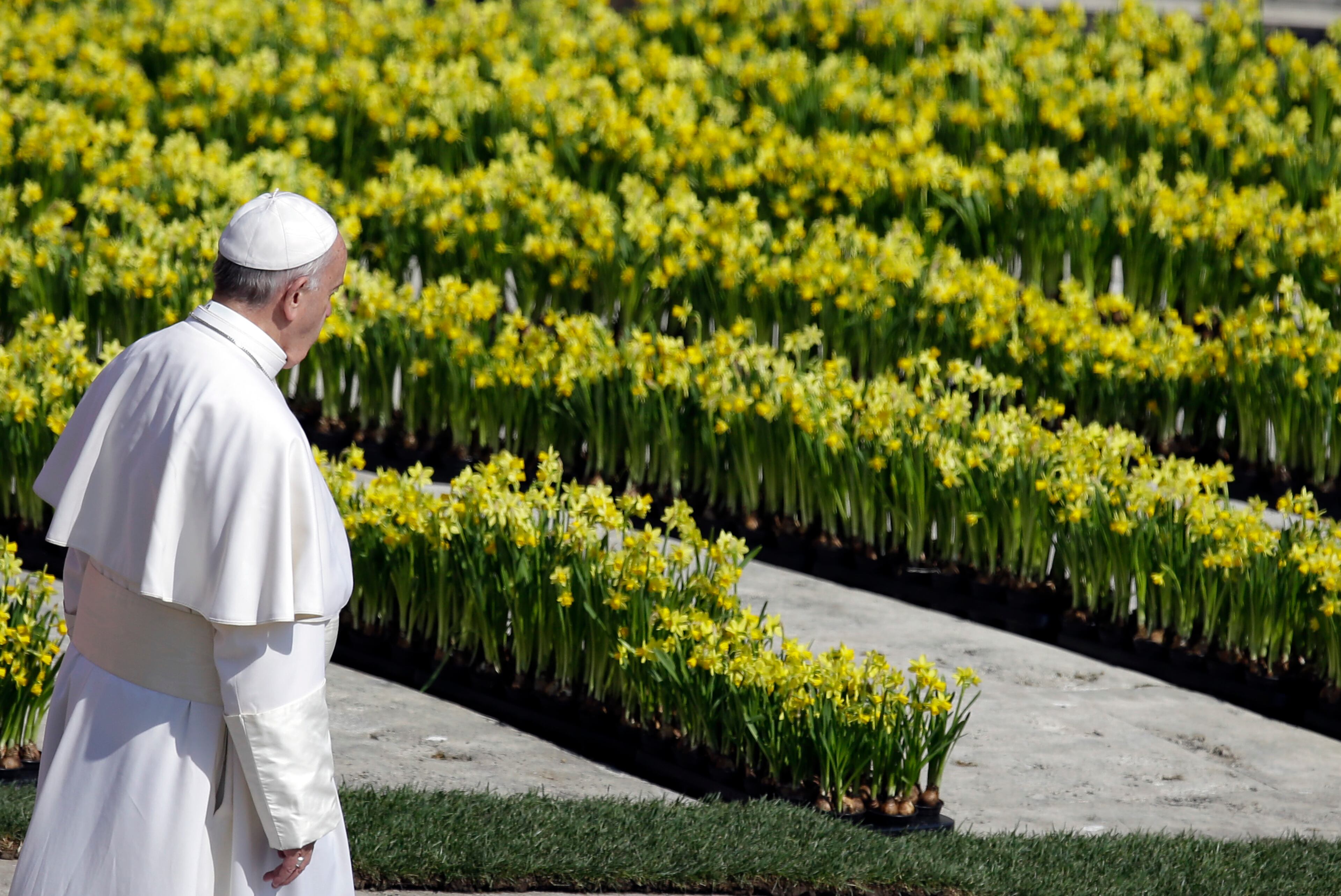 Pope Francis leaves at end of the Easter Mass, in St. Peter's Square, at the Vatican, on March 27, 2016.