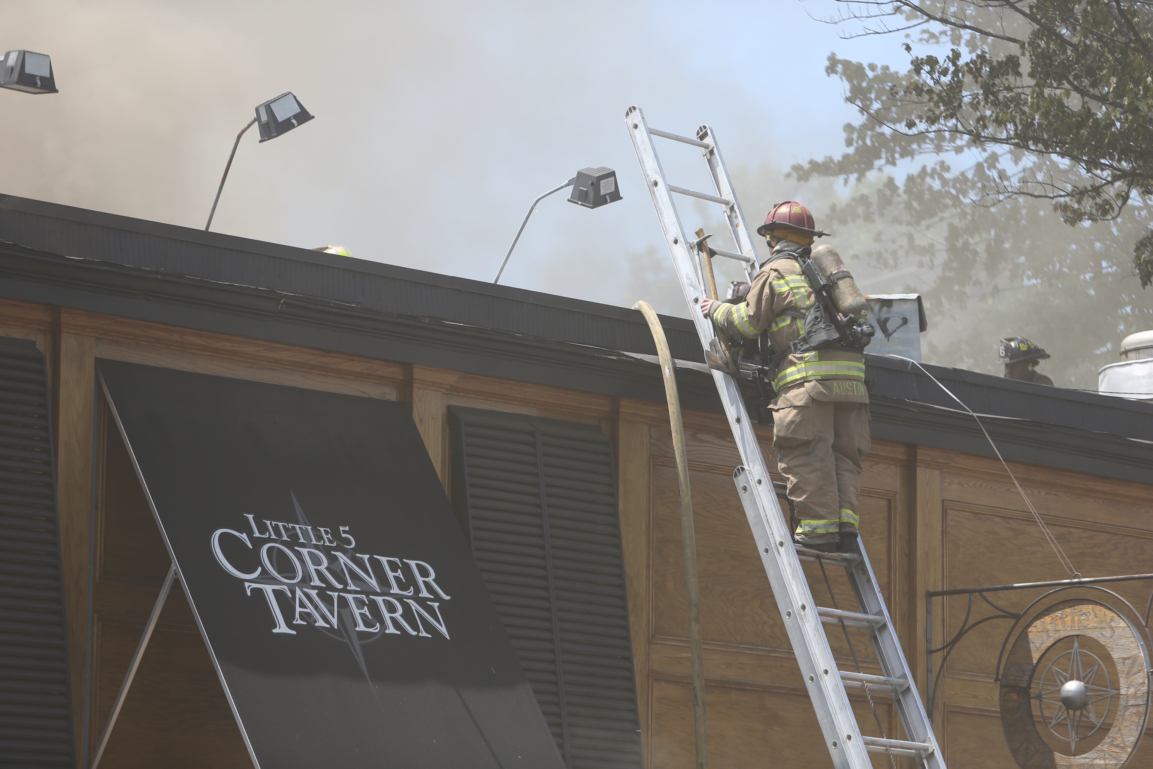 Firefighters battle a blaze at the Corner Tavern in Little Five Points on May 23, 2013.