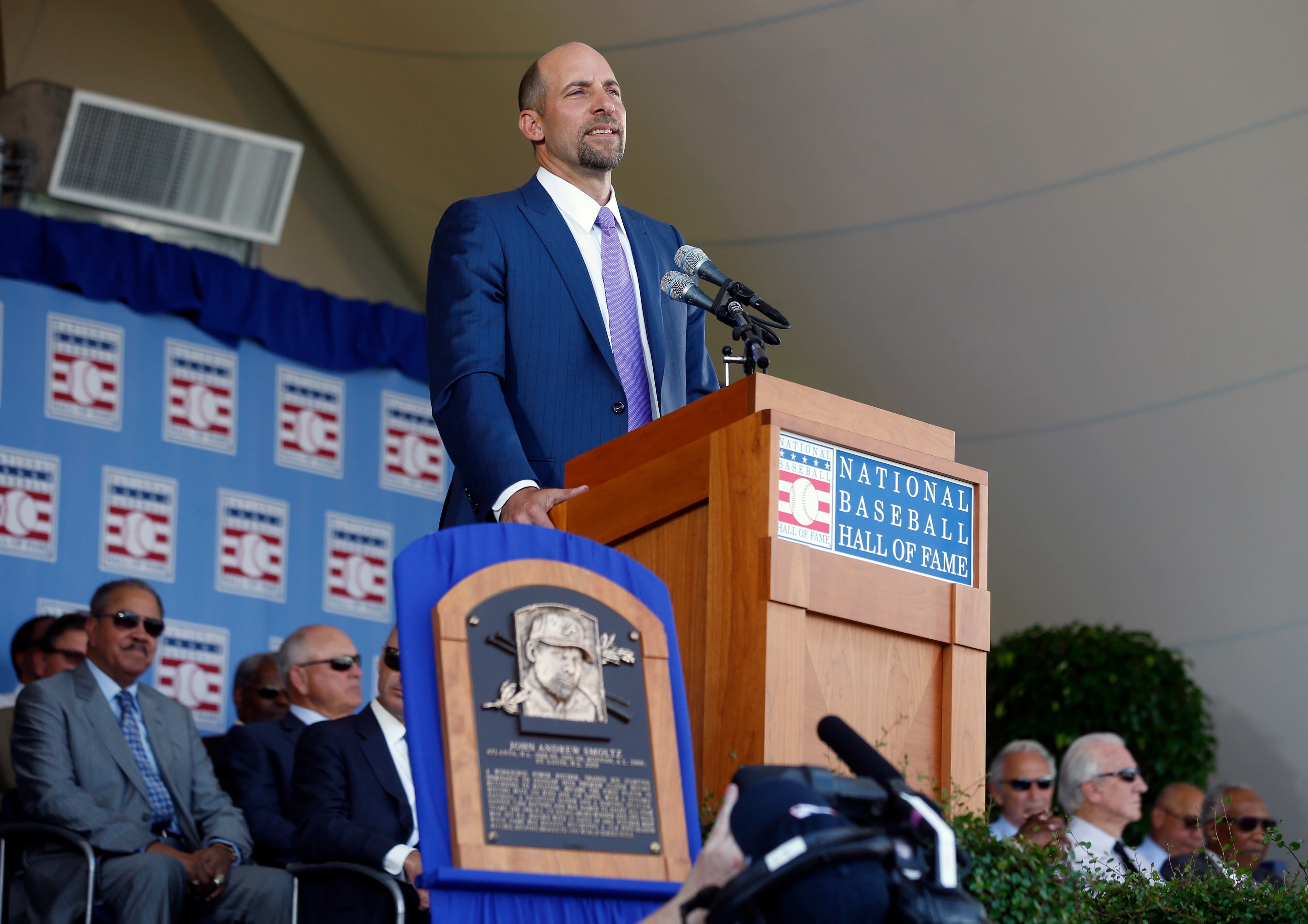 National Baseball Hall of Fame inductee John Smoltz speaks during an induction ceremony at the Clark Sports Center on Sunday, July 26, 2015, in Cooperstown, N.Y. (AP Photo/Mike Groll)