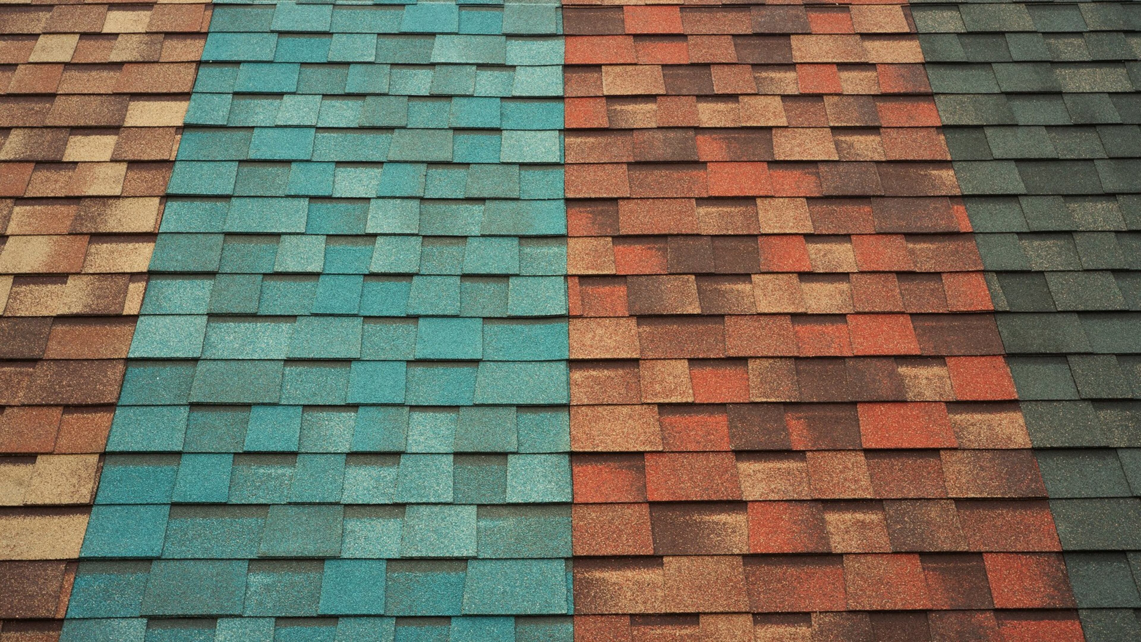 Asphalt shingles are the most common roofing material, and they are available in a surprising array of colors to complement your home and taste. (Dreamstime)