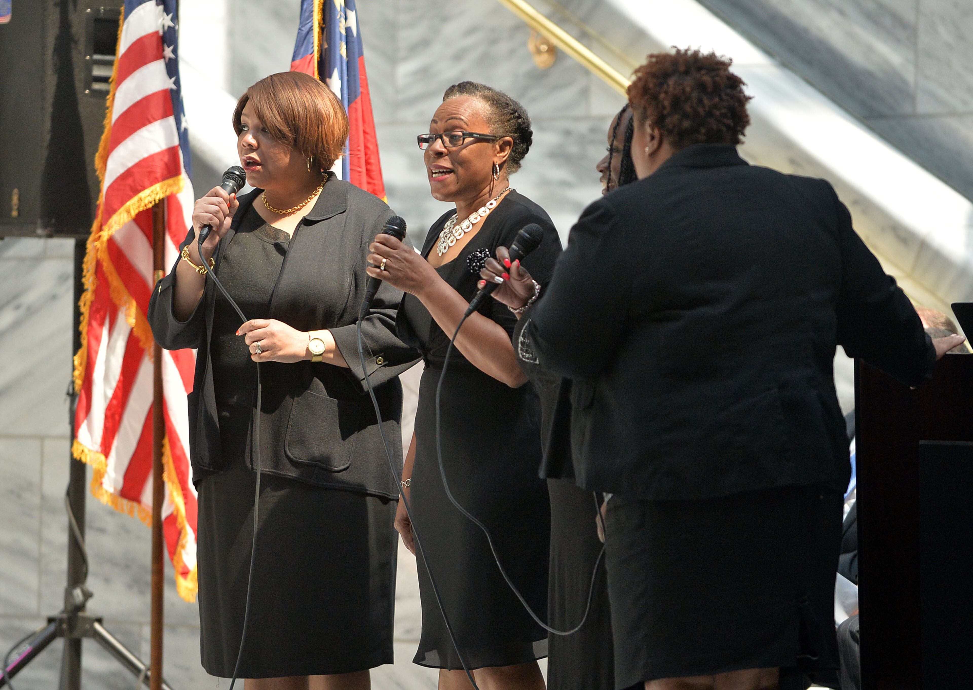 Members of the gospel group, Chosen, perform a musical selection during the service, The Atlanta Police Department recognized 82 fallen officers during the 24th Annual Police Memorial Service at the Atlanta City Hall atrium, Tuesday, May 5, 2015. The Right Rev. Robert C. Wright of the Episcopal Diocese of Atlanta was the keynote speaker. Additional speakers included Atlanta Police Chief George N. Turner, Michael Geisler, Chief Operating Officer, City Council President Ceasar C. Mitchell and Council member C.T. Martin, Public Safety Chair. KENT D. JOHNSON /KDJOHNSON@AJC.COM