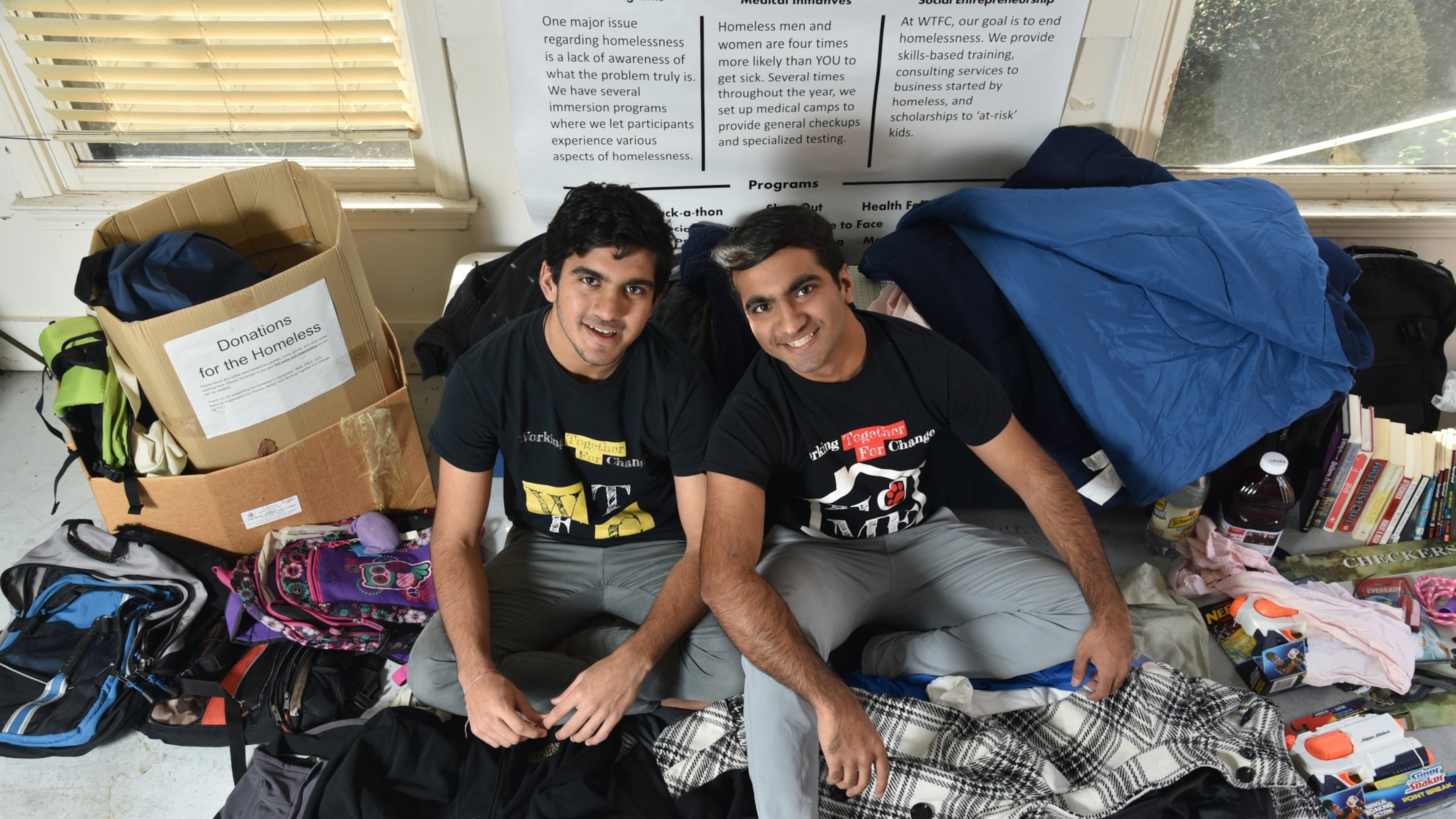 When Nitish Sood, left, and his brother Aditya founded Working Together for Change in 2013, they were hoping to create a space for dialogue about homelessness while addressing needs of the homeless population around metro Atlanta. HYOSUB SHIN / HSHIN@AJC.COM