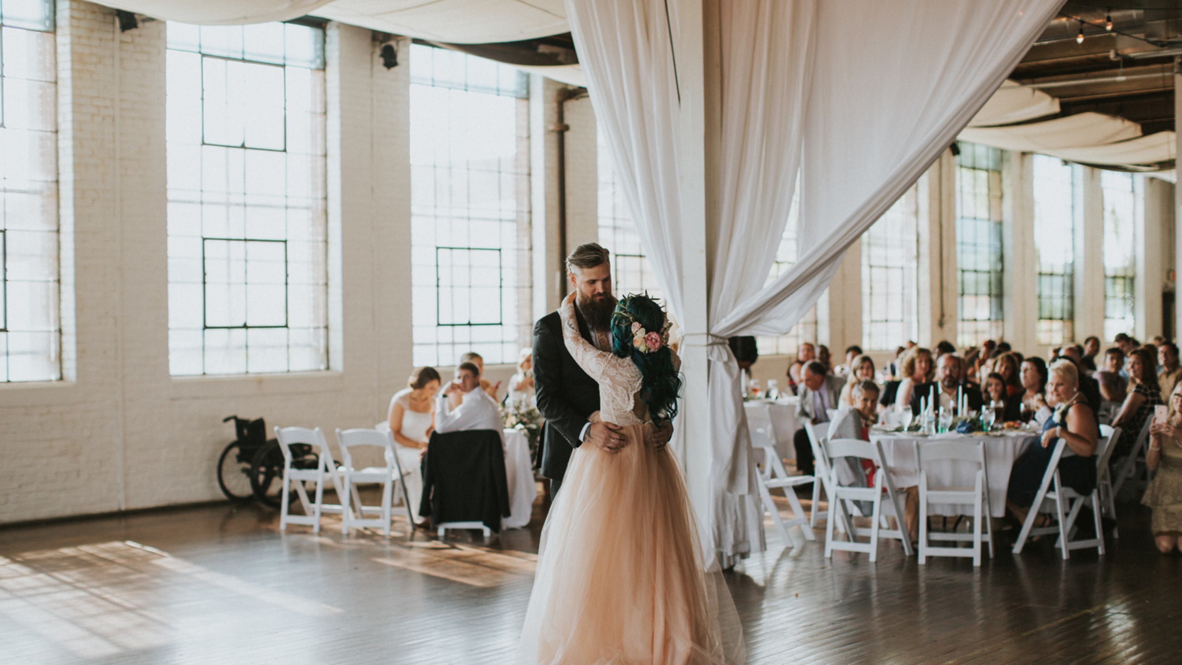 Jaquie Goncher, 25, walked at her wedding in Atlanta in May 2016 after being told by doctors she would never walk again after a pool accident. (Photo via Love Stories by Halie + Alec)