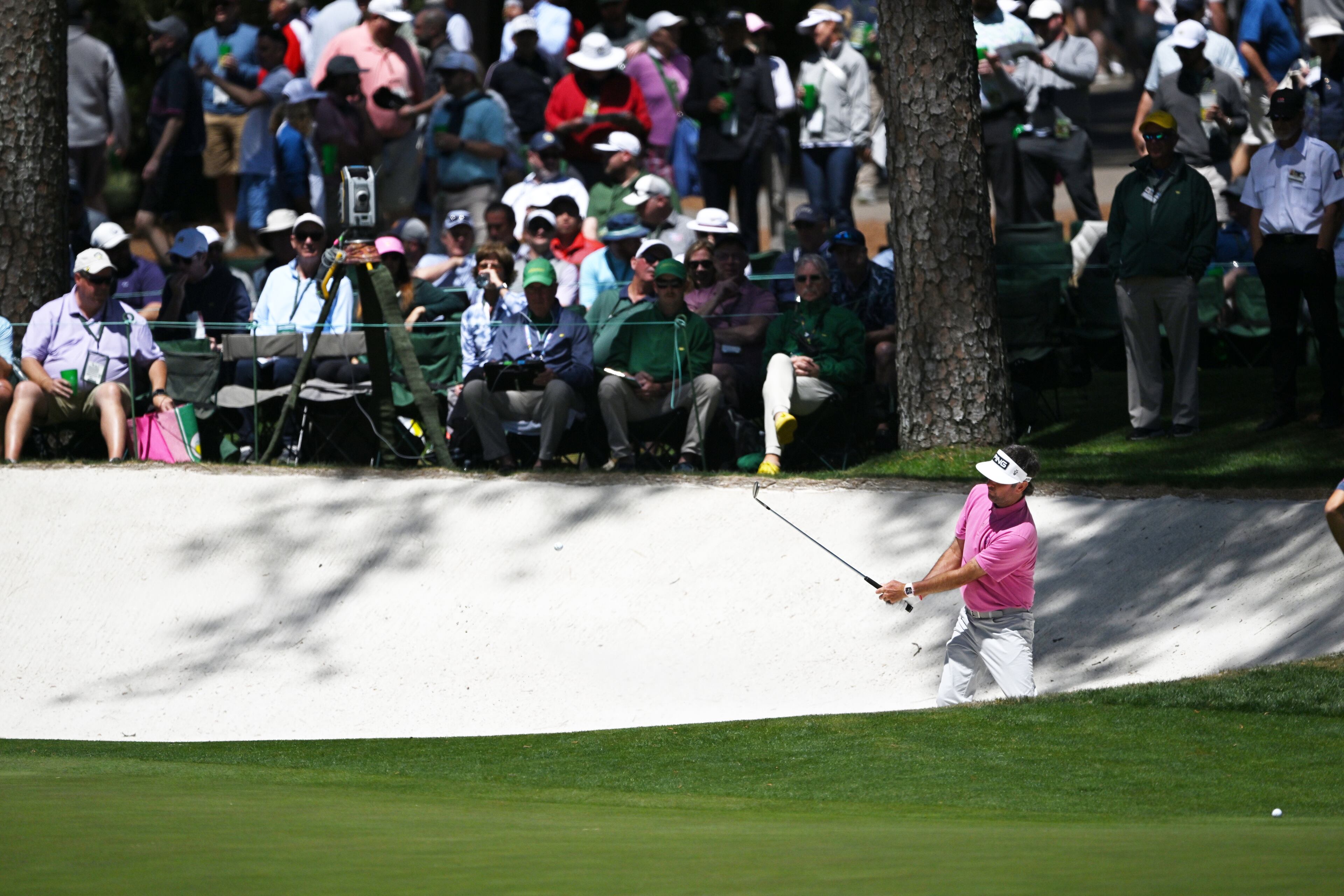 Bubba Watson hits from bunker on 16th hole during second round of the 2024 Masters Tournament at Augusta National Golf Club, Friday, April 12, 2024, in Augusta, Ga. (Hyosub Shin / Hyosub.Shin@ajc.com)