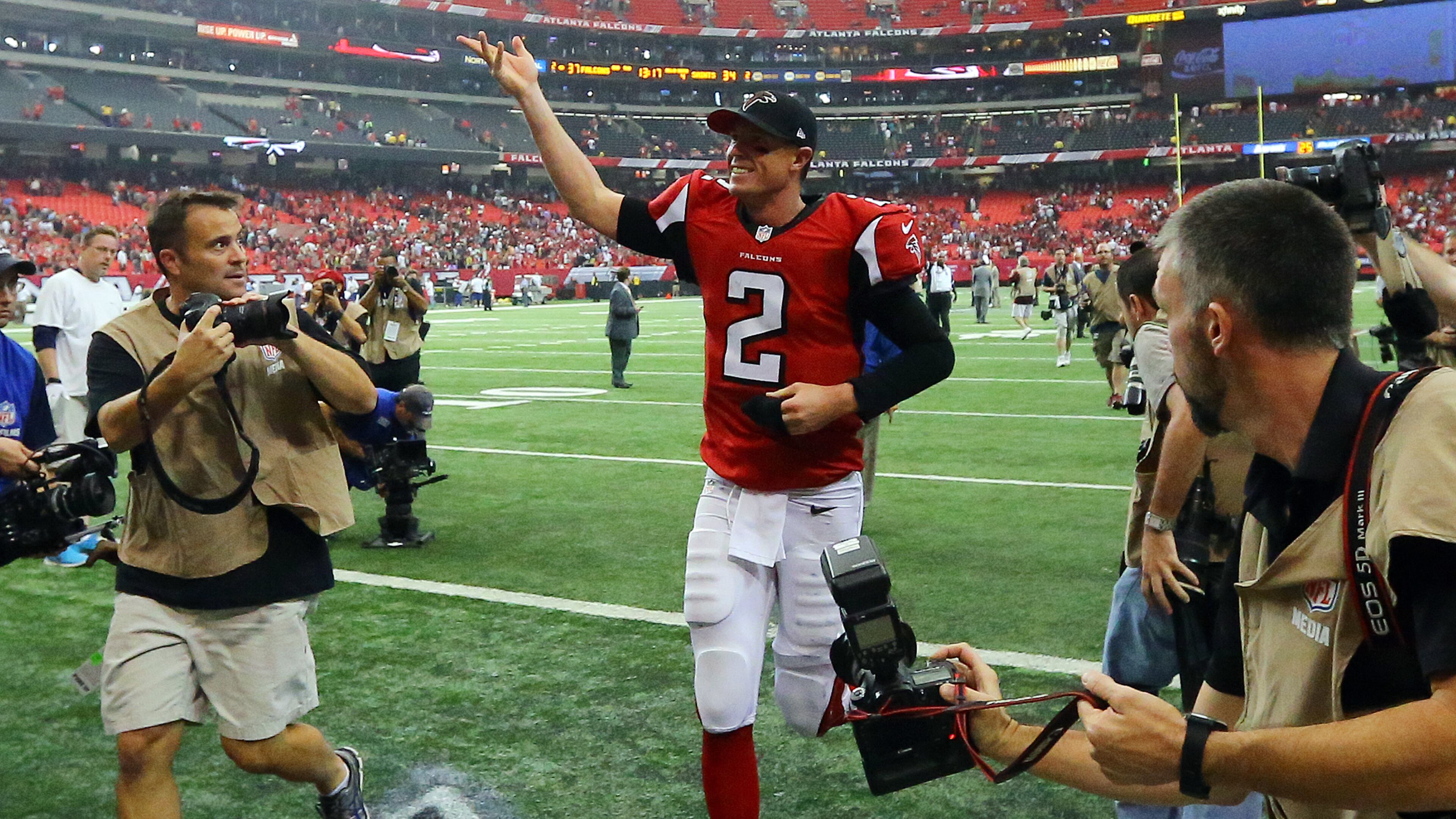 Falcons quarterback Matt Ryan celebrates a 37-34 overtime victory over the Saints in their NFL football game on Sunday, Sept. 7, 2014, in Atlanta.
