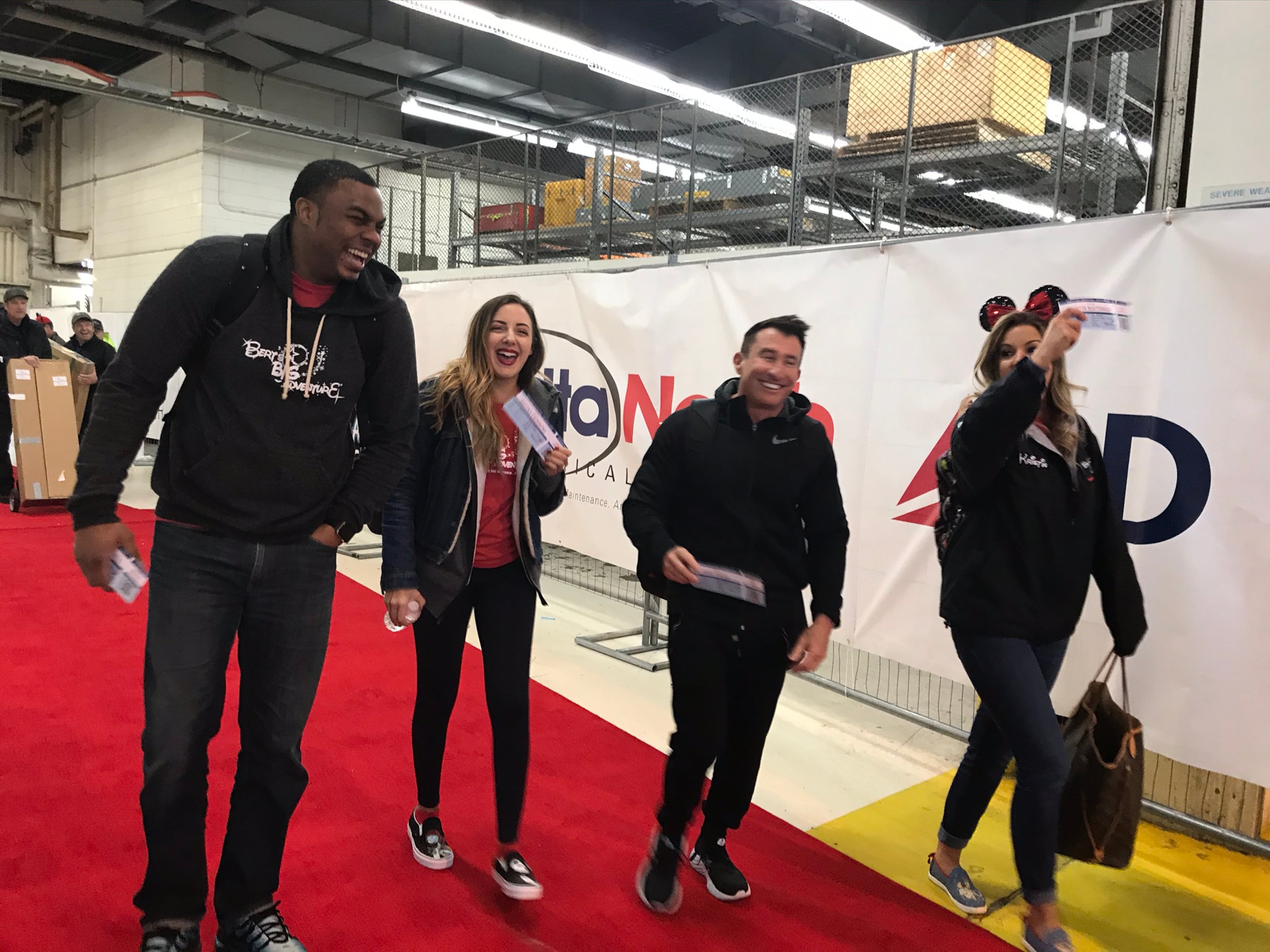 From left, Moe Mitchell, Kristin Klingshirn, Bert Weiss and Davi Crimmins were main cast members of the "Bert Show" in 2021. Crimmins was let go in 2022, and Mitchell is now officially gone. (Rodney Ho/AJC 2021)