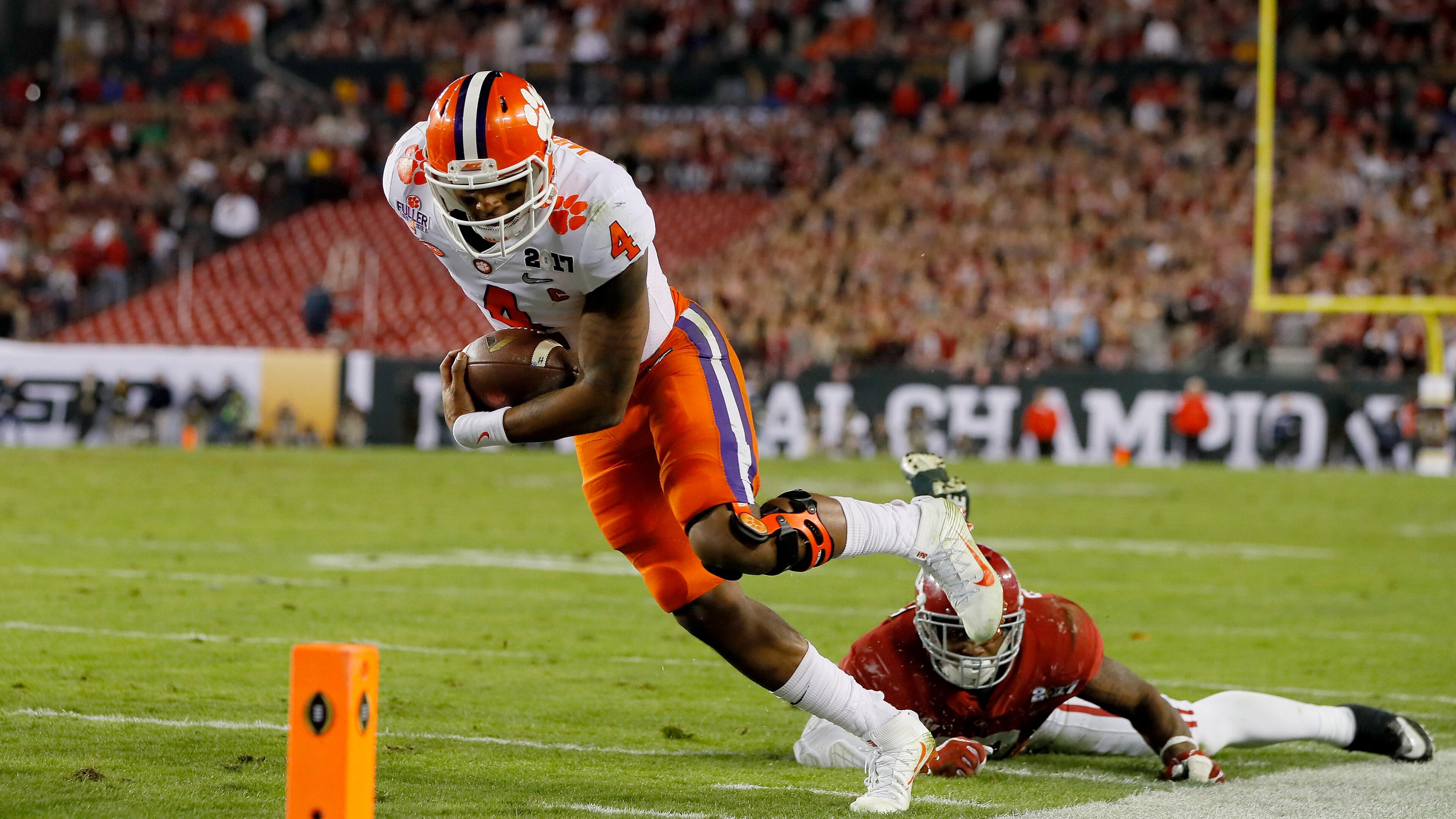Quarterback Deshaun Watson finishes off an 8-yard touchdown run during the second quarter against the Alabama in Monday’s national championship game. (Kevin C. Cox/Getty Images)