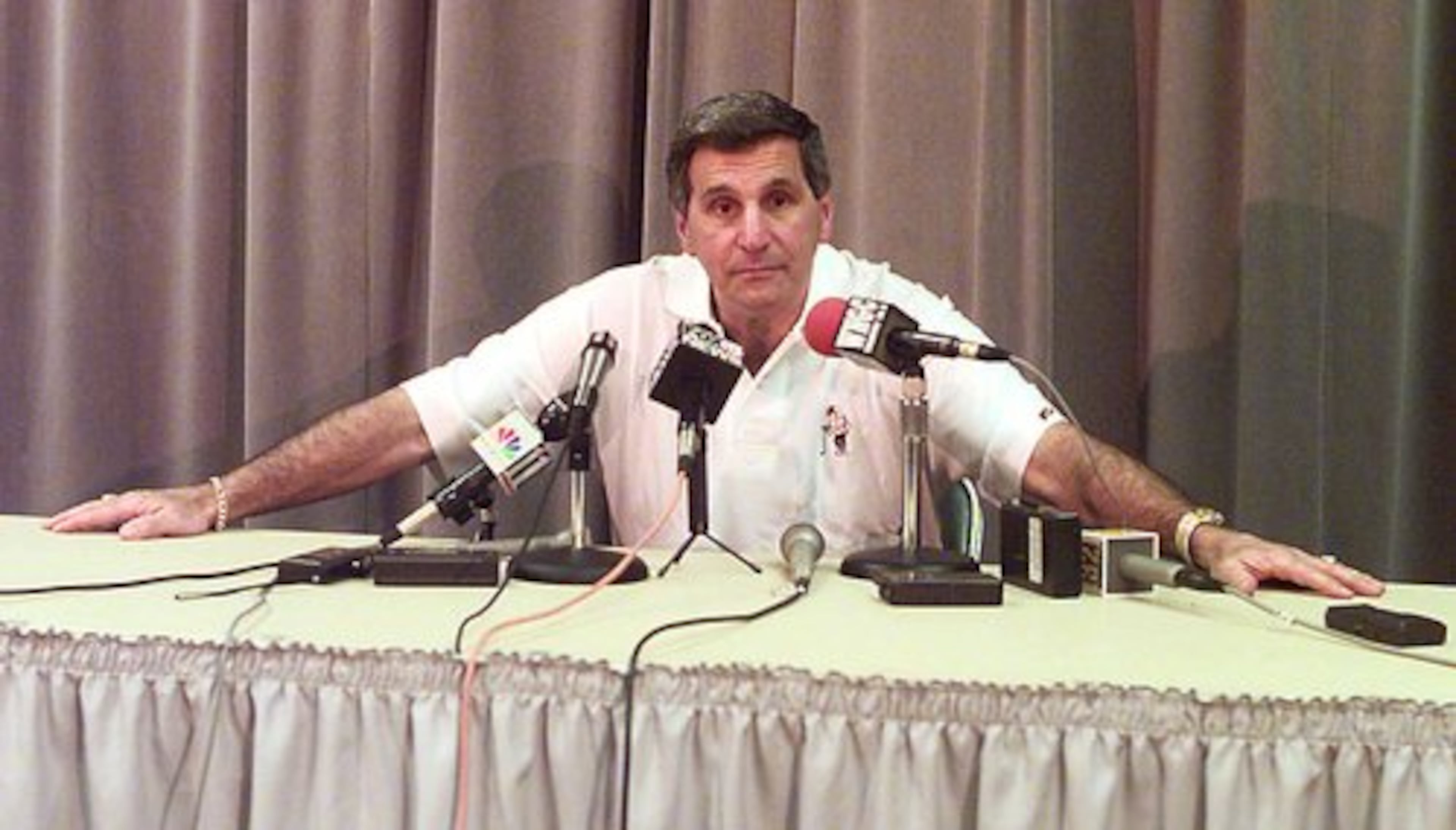 Former Georgia basketball coach Jim Harrick resigned (alongside son Jim Jr.) amid an academic scandal.