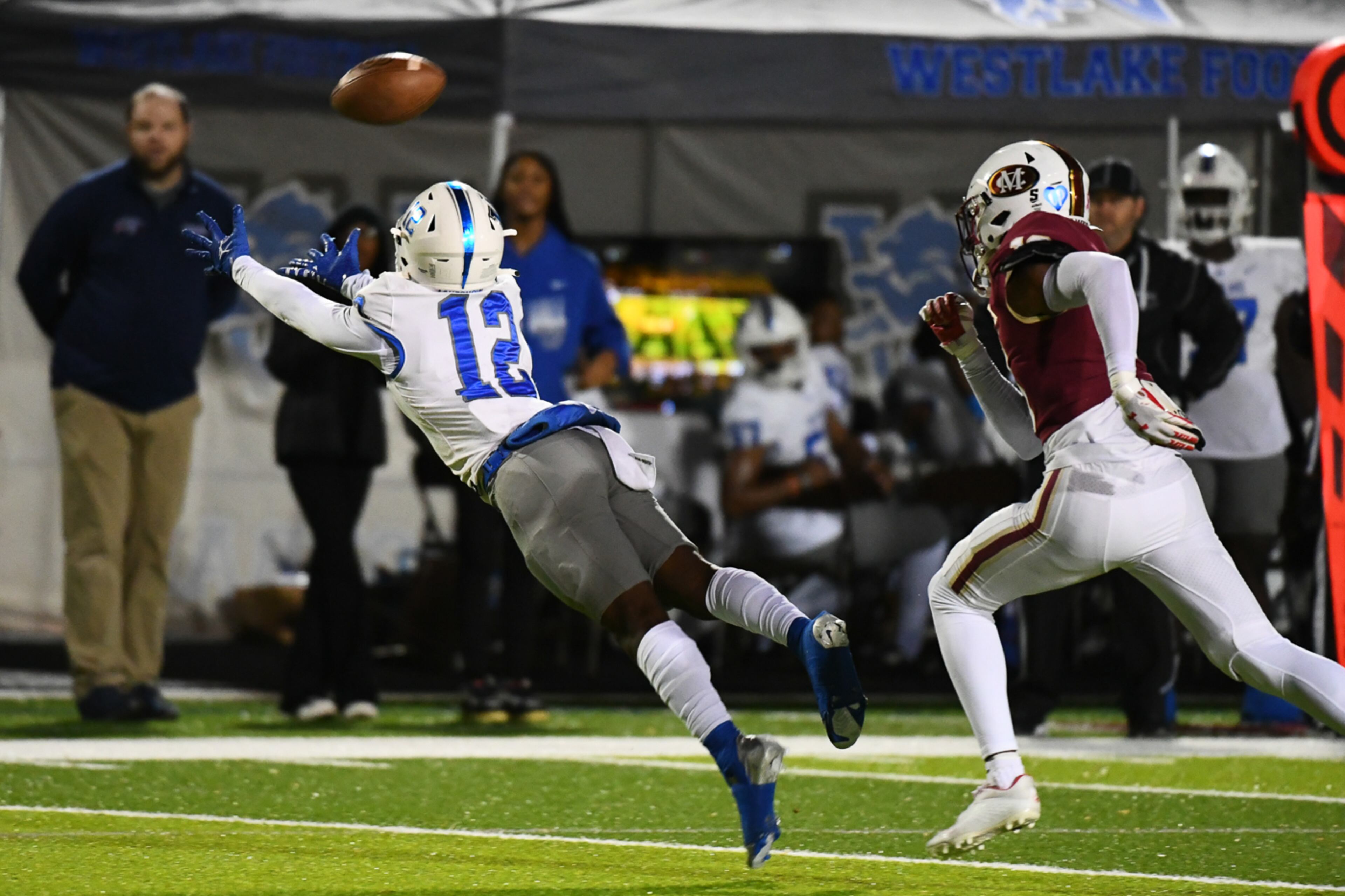 Jabari Jones, wide receiver for Westlake, dives for a catch. (Jamie Spaar for the Atlanta Journal Constitution)