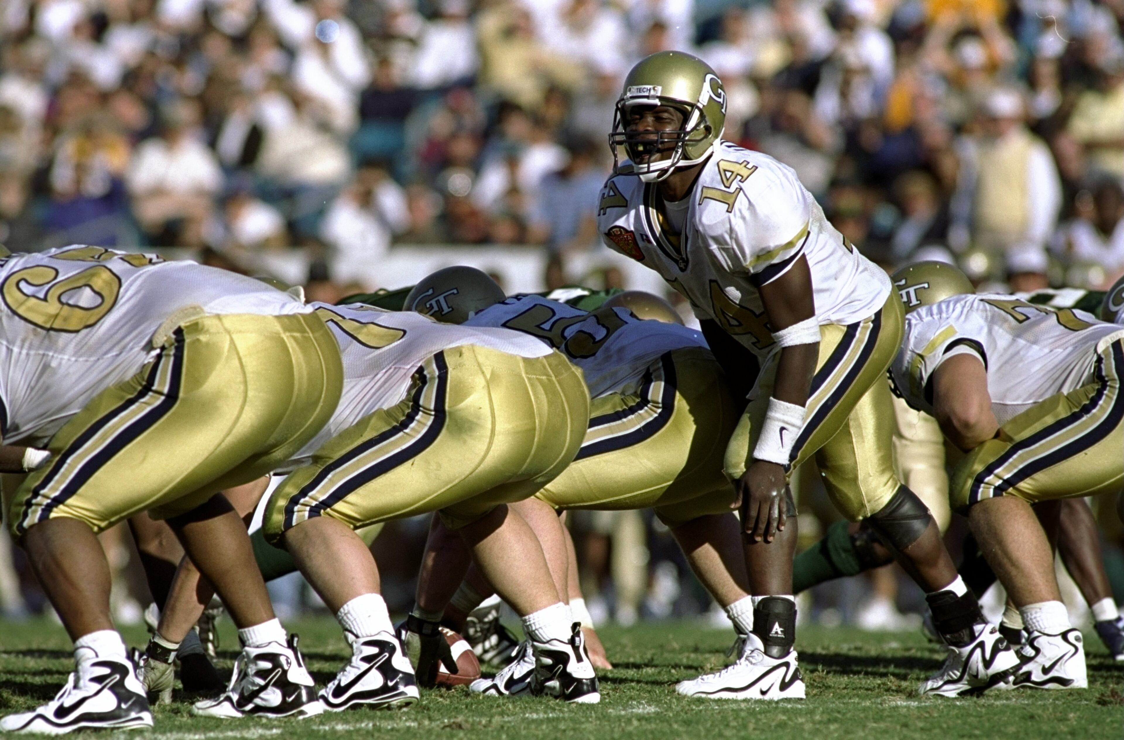 1 Jan 1999: Joe Hamilton #14 of the Georgia Tech Yellow Jackets calls from the line of scrimmage during the Toyota Gator Bowl against the Notre Dame Fighting Irish at Alltel Stadium in Jacksonville, Florida. Georgia Tech defeated Notre Dame 35-28. Mandatory Credit: Craig Jones /Allsport