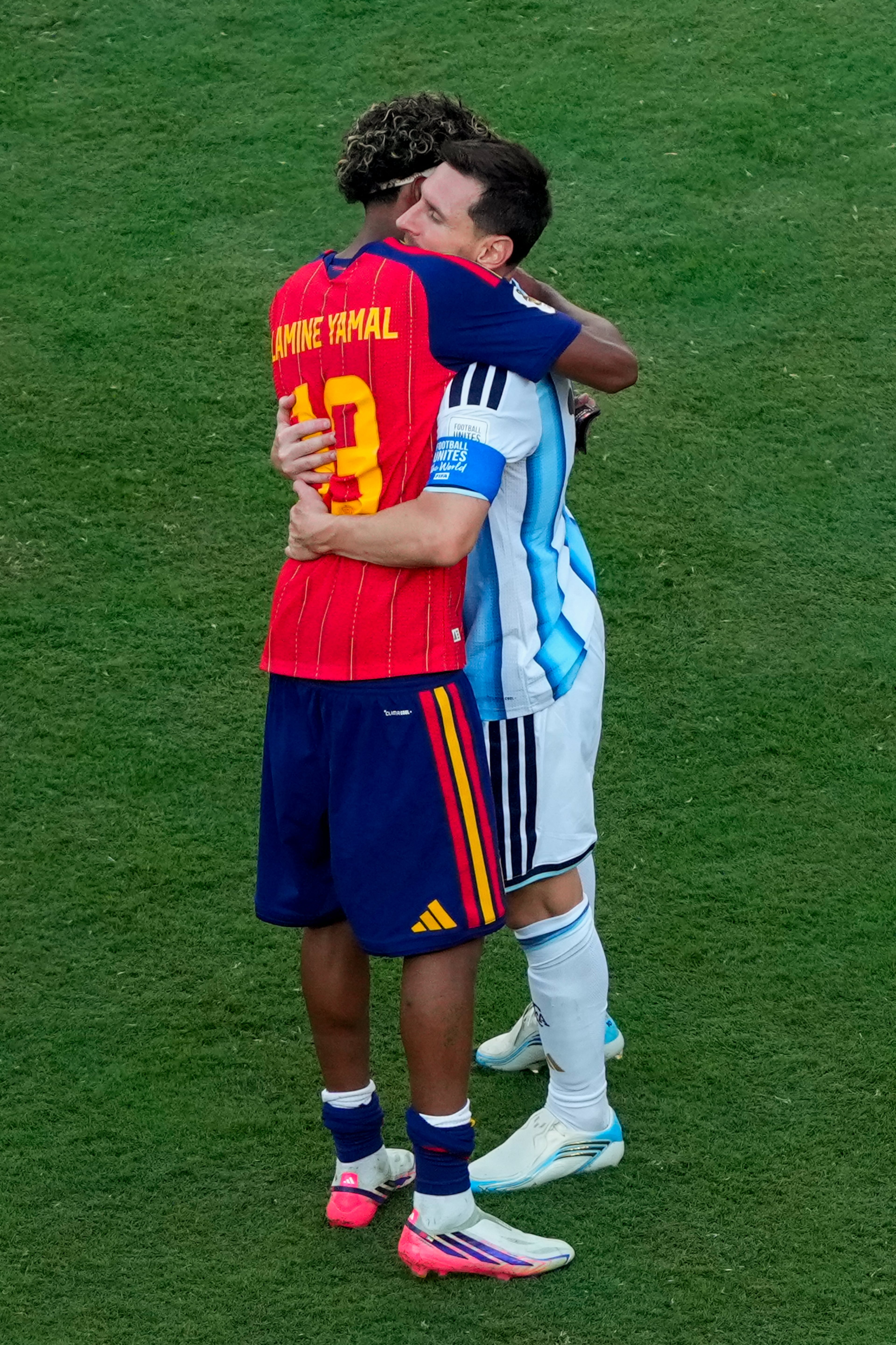 Argentina's Lionel Messi (right) hugs Spain's Lamine Yamal (left) after the World Cup final soccer match between Spain and Argentina in East Rutherford, N.J., near New York, Sunday, July 19, 2026. (Yuki Iwamura/AP)