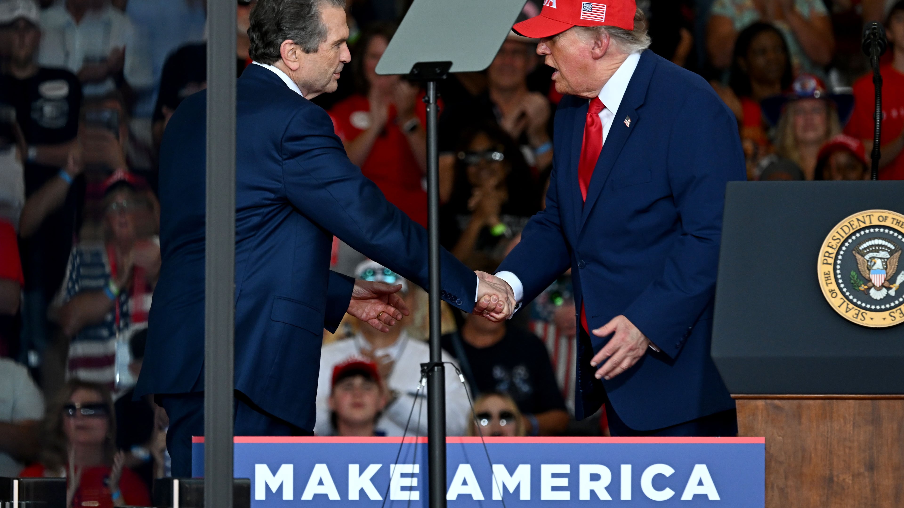 Georgia Republican governor nominee Rick Jackson is greeted by President Donald Trump during a campaign rally at Dalton Municipal Airport on Friday, Oct. 16, 2026, in Dalton. Jackson is joining President Trump in Perry on Saturday for a campaign rally aimed at firing up Republicans less than two weeks before Election Day. (Hyosub Shin/AJC)