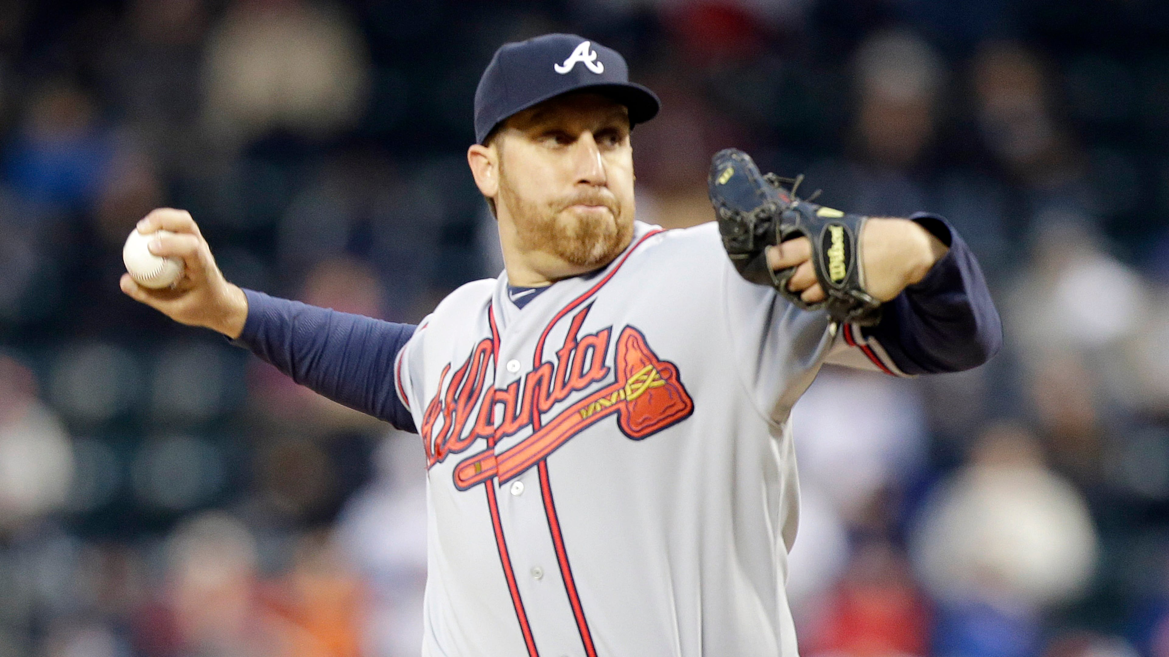 Atlanta Braves' Aaron Harang delivers a pitch during the first inning of a baseball game against the New York Mets, Friday, April 18, 2014, in New York. (AP Photo/Frank Franklin II)