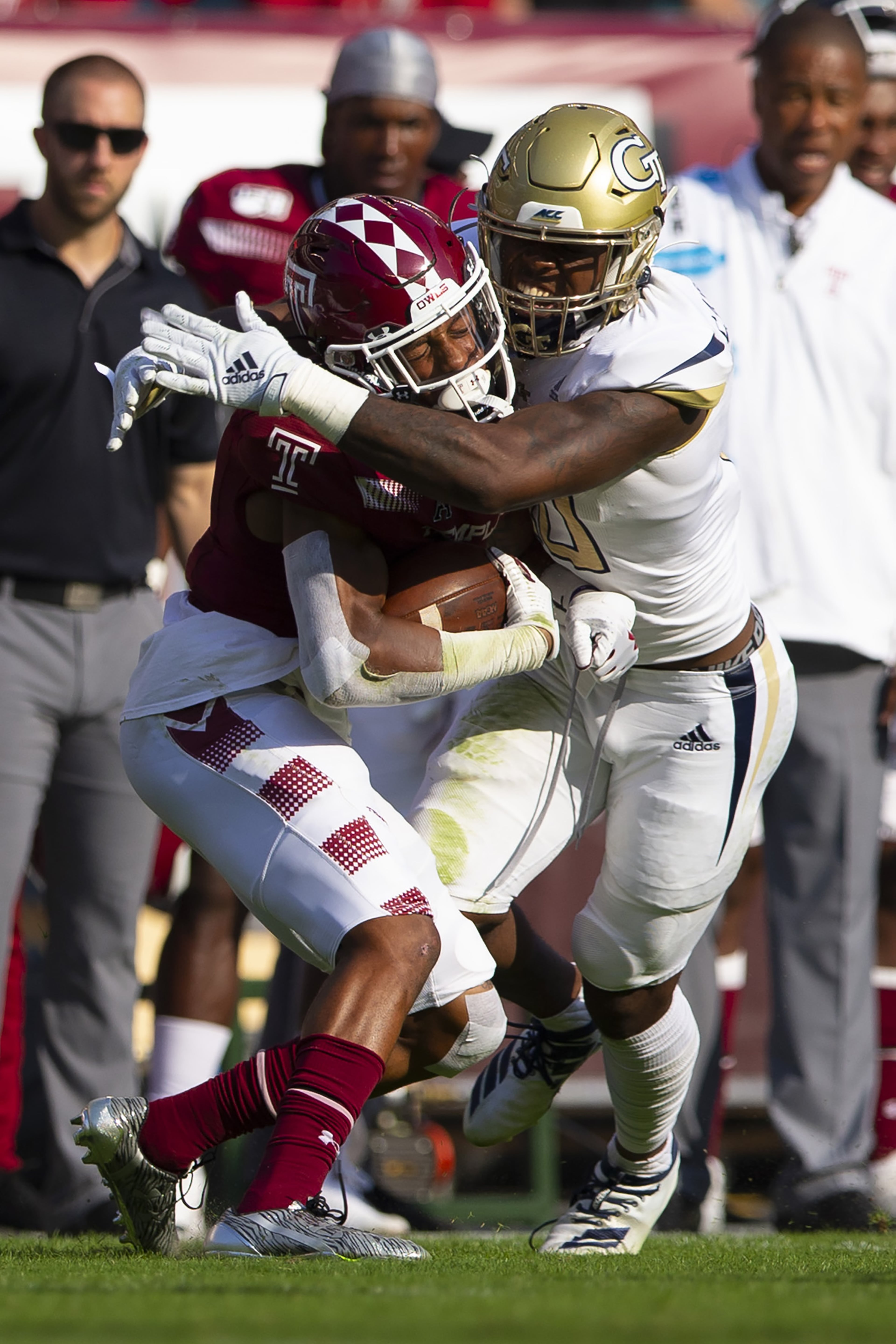 Temple's Jadan Blue is tackled by Christian Campbell in the first quarter. (Photo by Mitchell Leff/Getty Images)