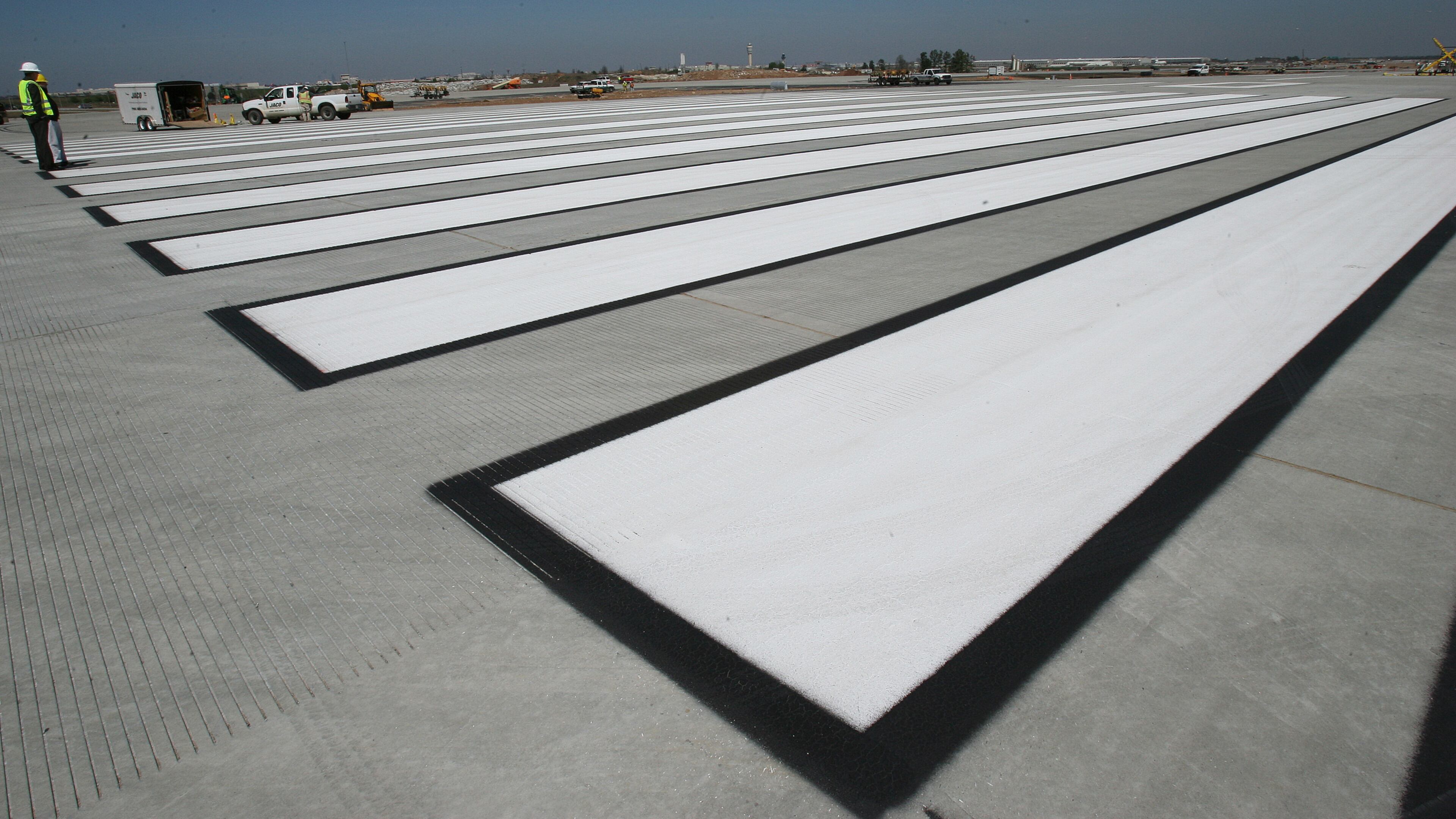 060322 - HAPEVILLE, GA -- These giant painted lines can be seen at the construction site on the fifth runway at Hartsfield Jackson Atlanta International Airport on Wednesday, March 22, 2006. (JOHNNY CRAWFORD/AJC staff)