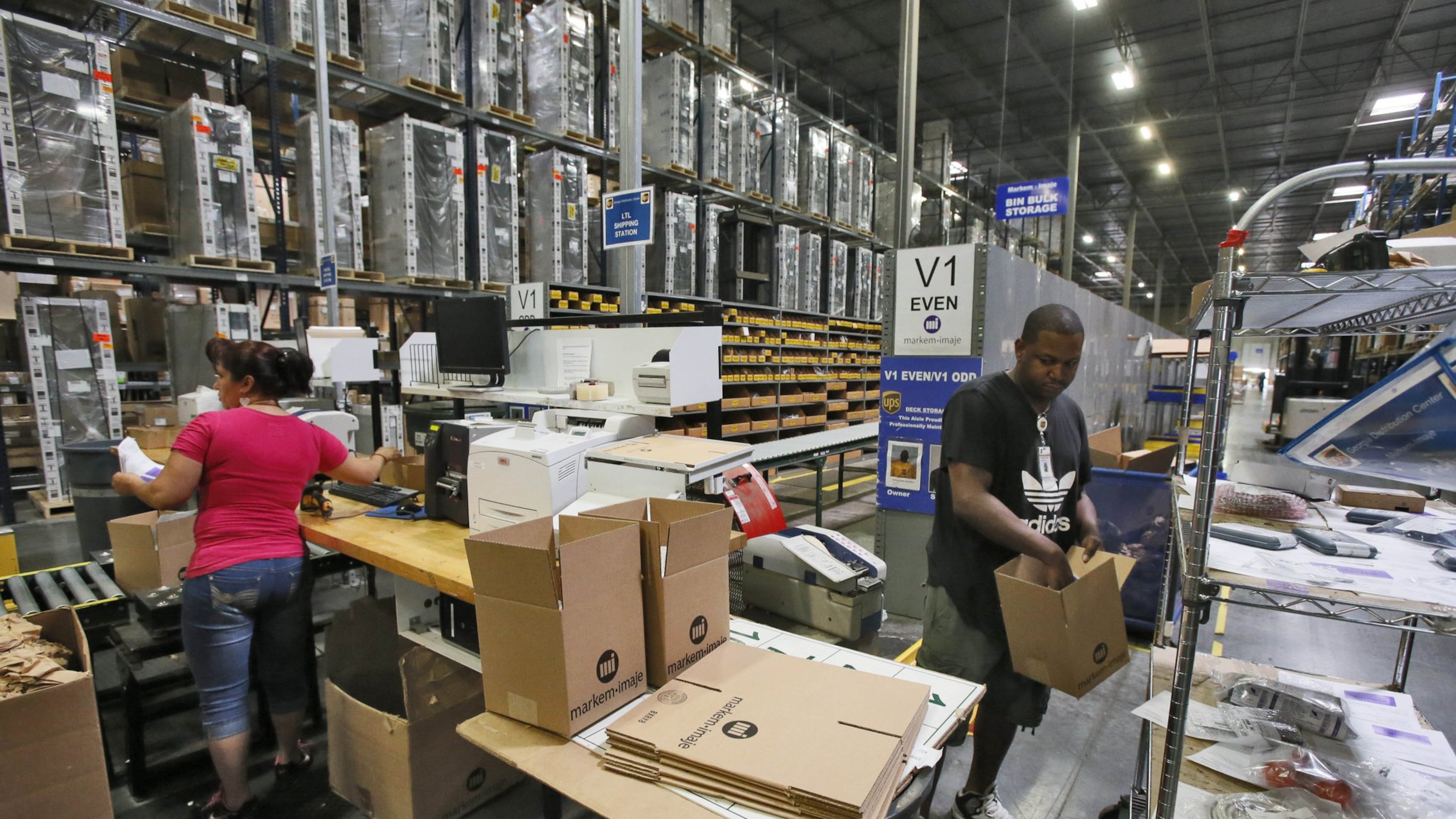 Workers at a UPS facility near the Atlanta airport. The company plans a massive ground-shipping hub on Atlanta’s west side. BOB ANDRES / BANDRES@AJC.COM