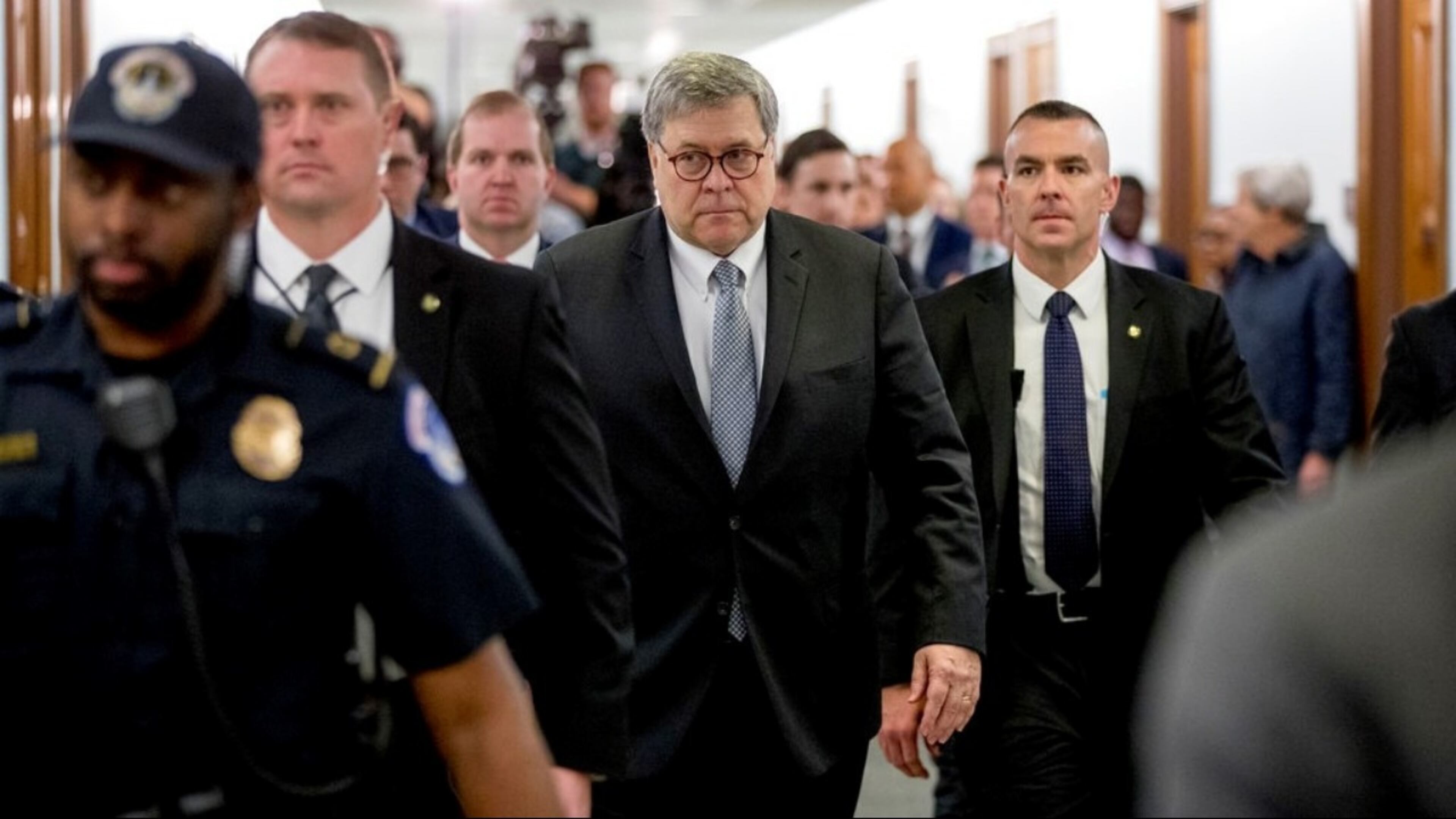 Attorney General William Barr departs following a Senate Appropriations subcommittee to make his Justice Department budget request, Wednesday, April 10, 2019, in Washington, a day after telling House lawmakers that he expects to release a redacted version of special counsel Robert Mueller's report "within a week." At the House hearing, Barr bluntly defended himself, arguing that portions of the document need to be redacted to comply with the law.