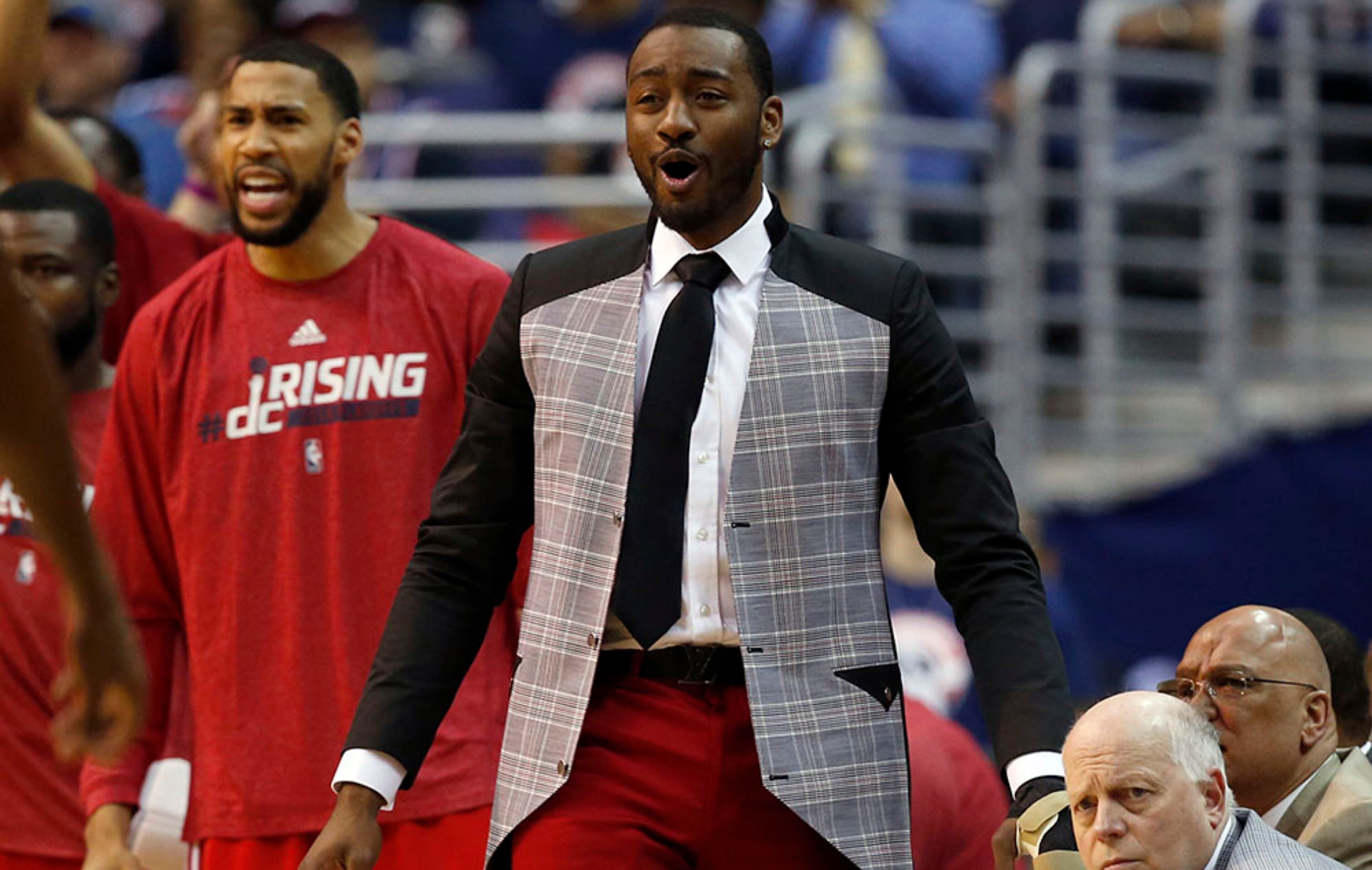 Washington Wizards guard John Wall reacts in the first half of Game 4 of the second round of the NBA basketball playoffs Atlanta Hawks, Monday, May 11, 2015, in Washington. The Hawks won 106-101. Wall has missed the last three games of the series due to an injury. (AP Photo/Alex Brandon)