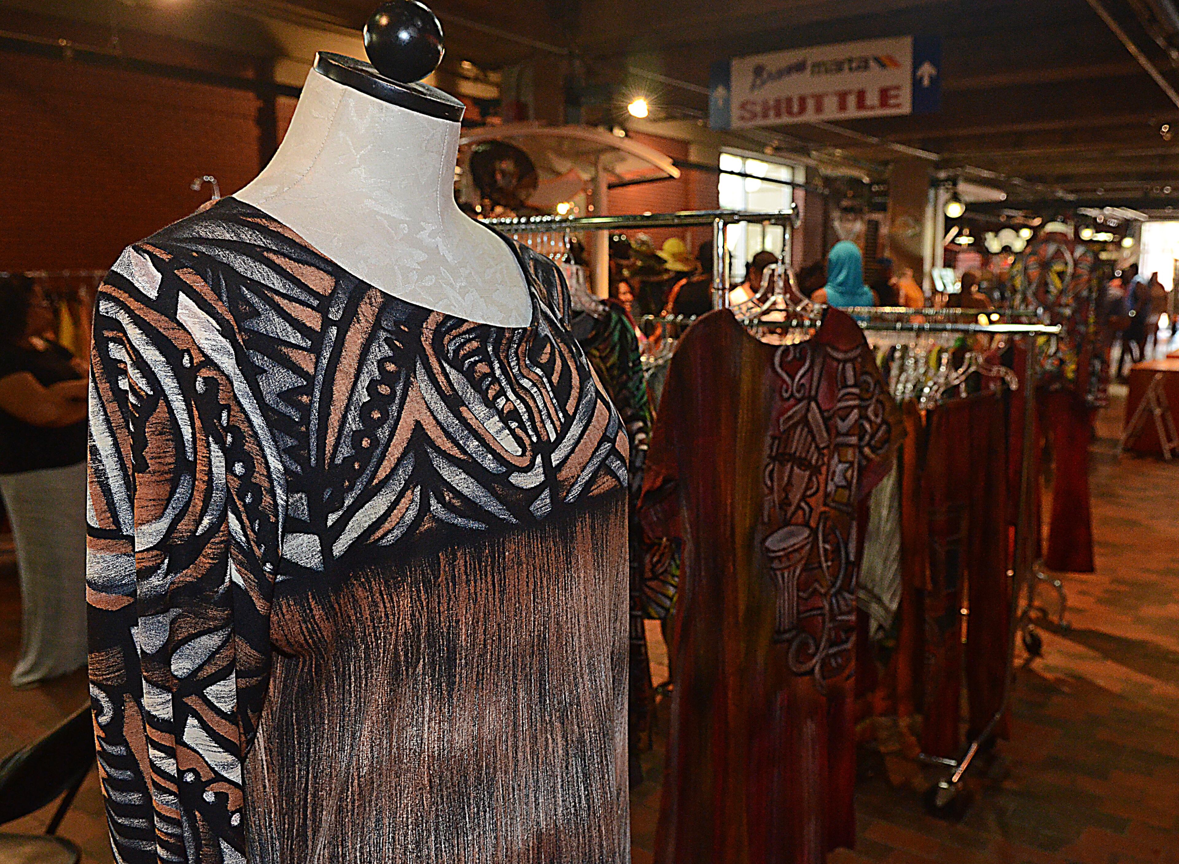 Wearable Art by Allohn assembled from hand painted fabric make a bold and beautiful statement at the 19th Annual Heritage Arts and Soul Festival at Underground Atlanta. The event features the work of over 30 artist, featuring fine art and wearable art ,plus an emerging artist pavillion, fashion show. (CHRIS HUNT/SPECIAL)