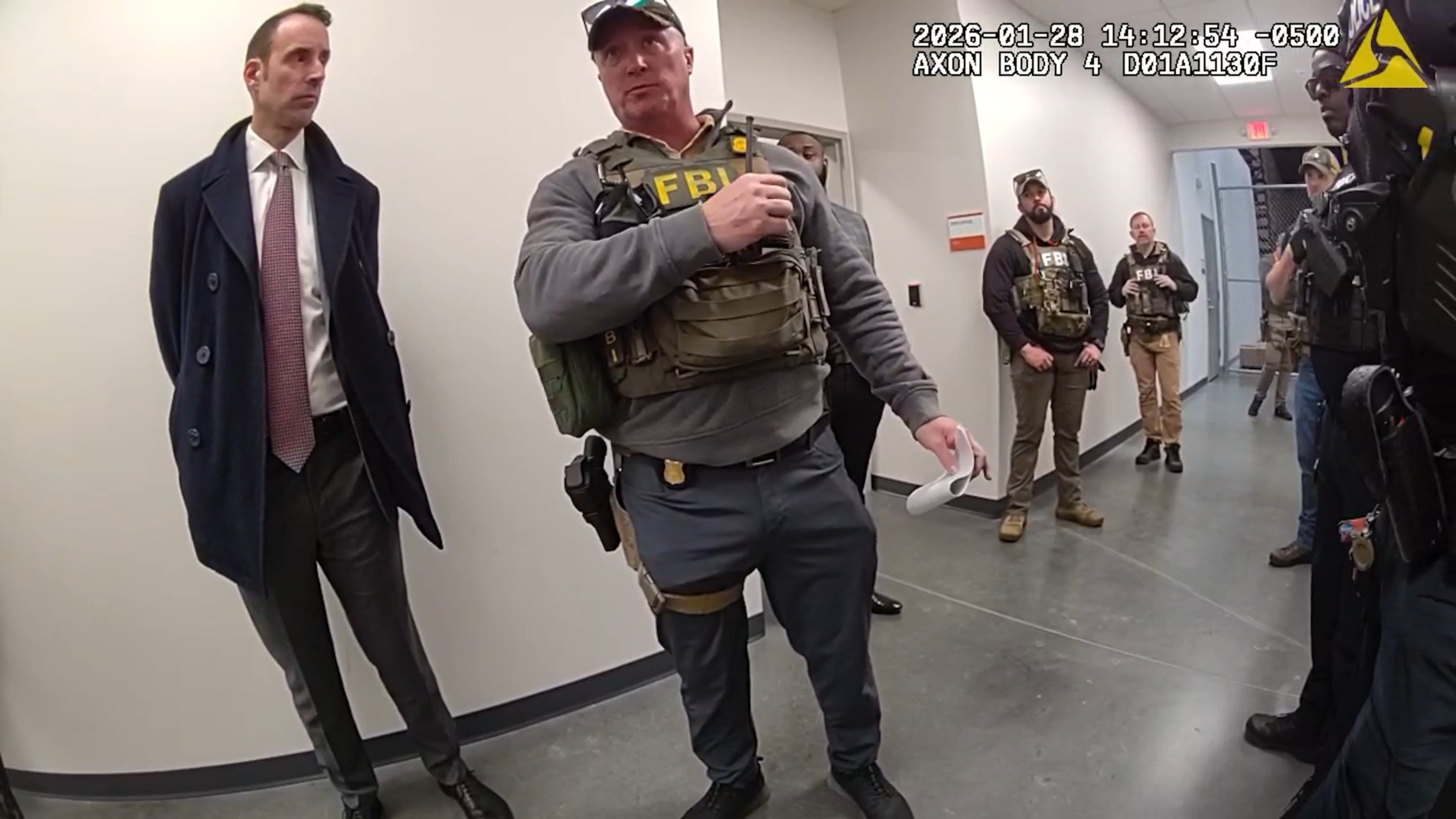 Bodycam footage obtained by the AJC shows Fulton County police and FBI agents executing a search warrant at the county's election office. Critics say a pending bill would make such videos harder to access.