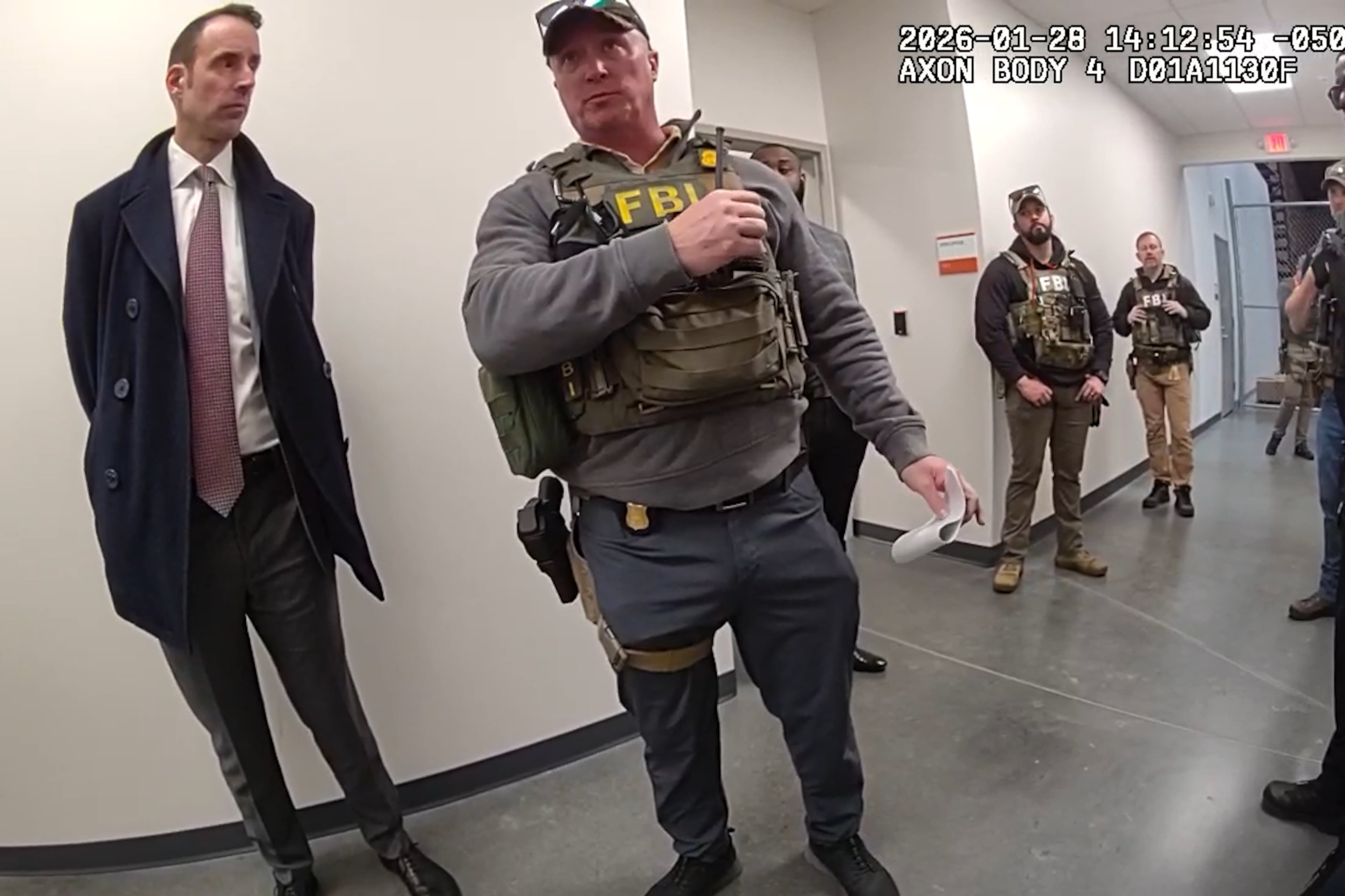 Bodycam footage obtained by the AJC shows Fulton County Police Department officers and FBI agents during the execution of a search warrant at Fulton County’s election office. Critics say a bill pending in the General Assembly would make it harder to obtain such video.