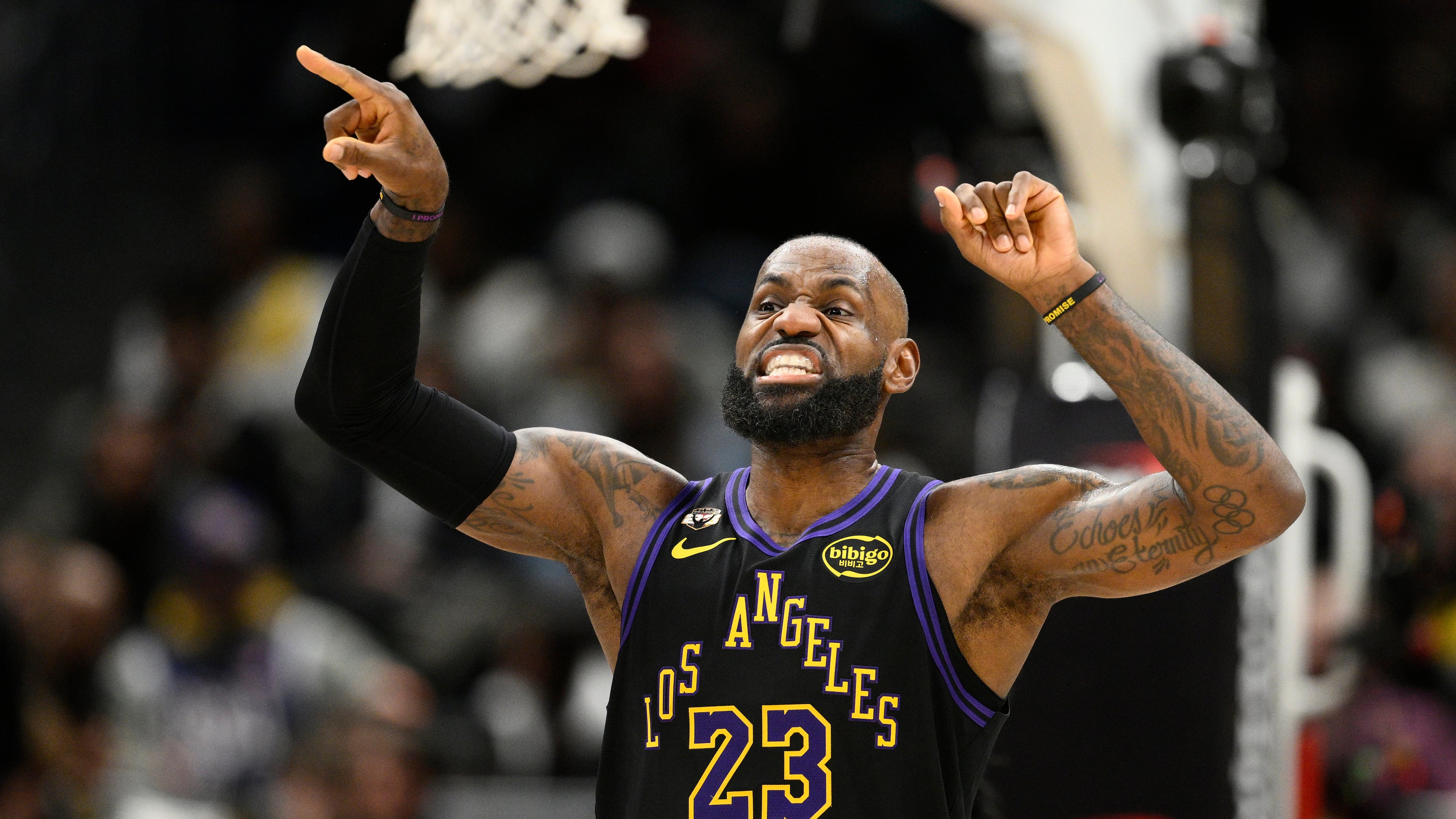 Los Angeles Lakers forward LeBron James gestures during the first half of an NBA basketball game against the Washington Wizards, Friday, Jan. 30, 2026, in Washington. (AP Photo/Nick Wass)